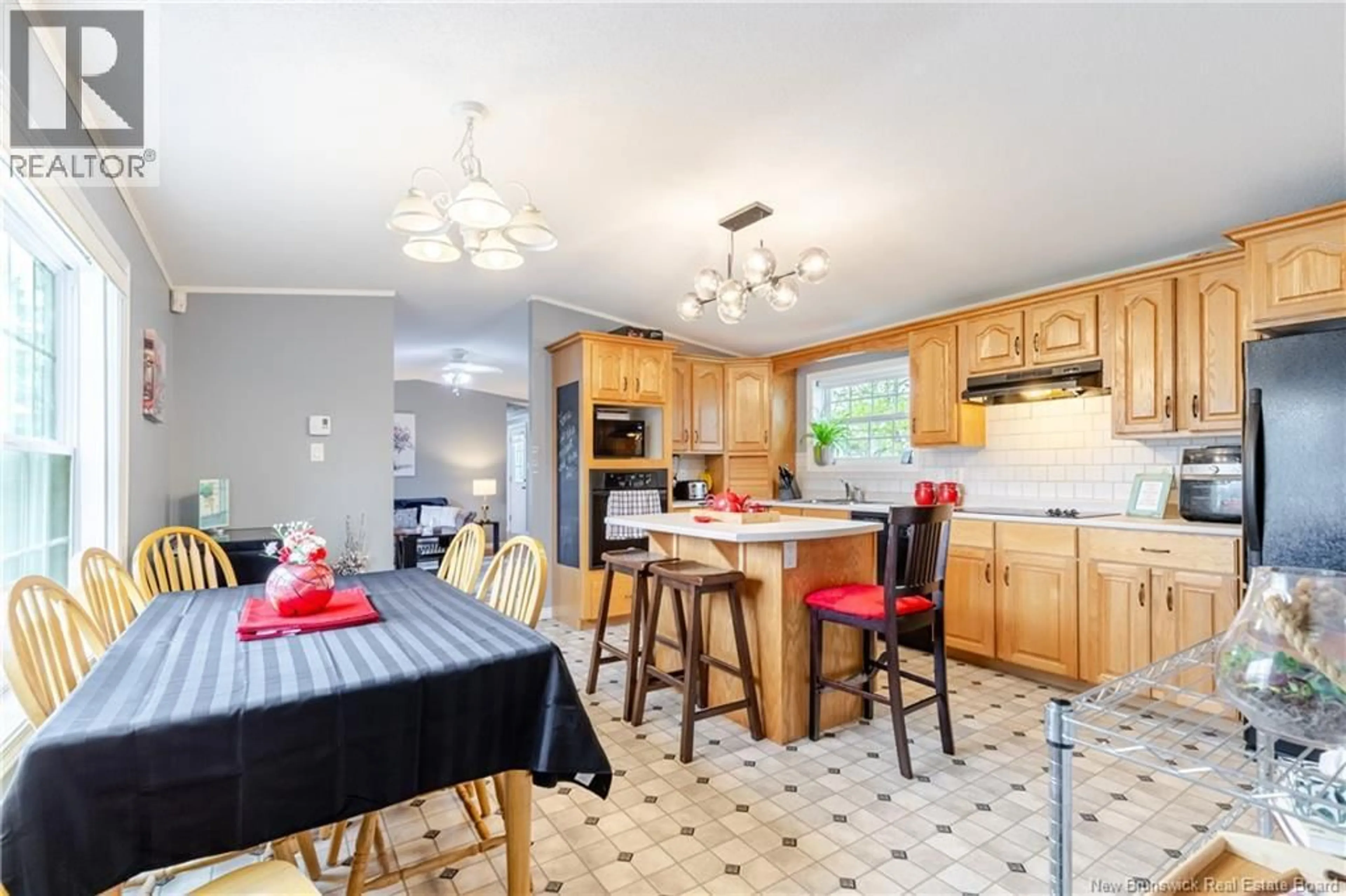 Open concept kitchen, ceramic/tile floor for 2 WOOD AVENUE, Lincoln New Brunswick E3B6V5