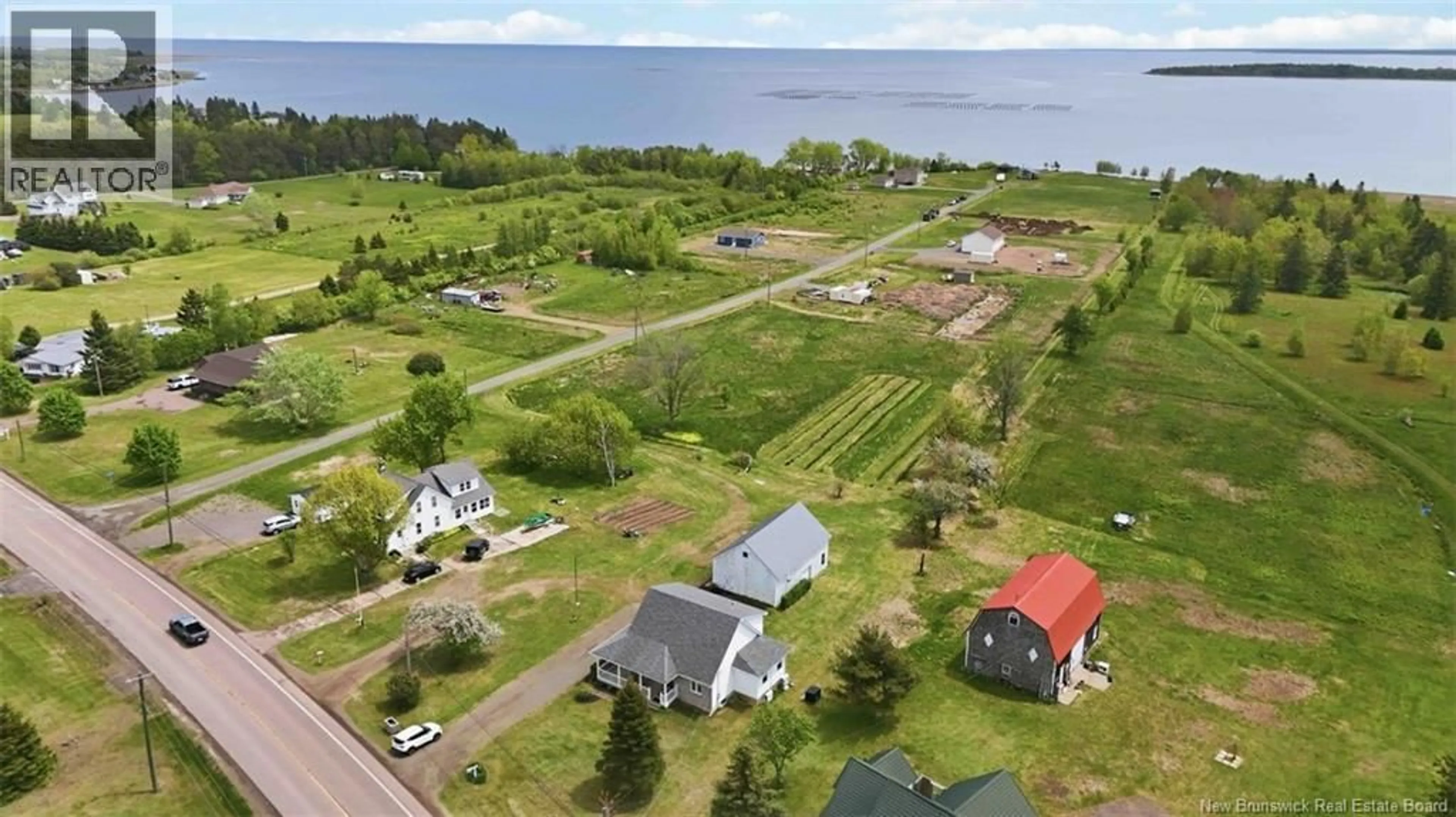 A pic from outside/outdoor area/front of a property/back of a property/a pic from drone, water/lake/river/ocean view for 248 ROUTE 530, Grande-Digue New Brunswick E4R5J8