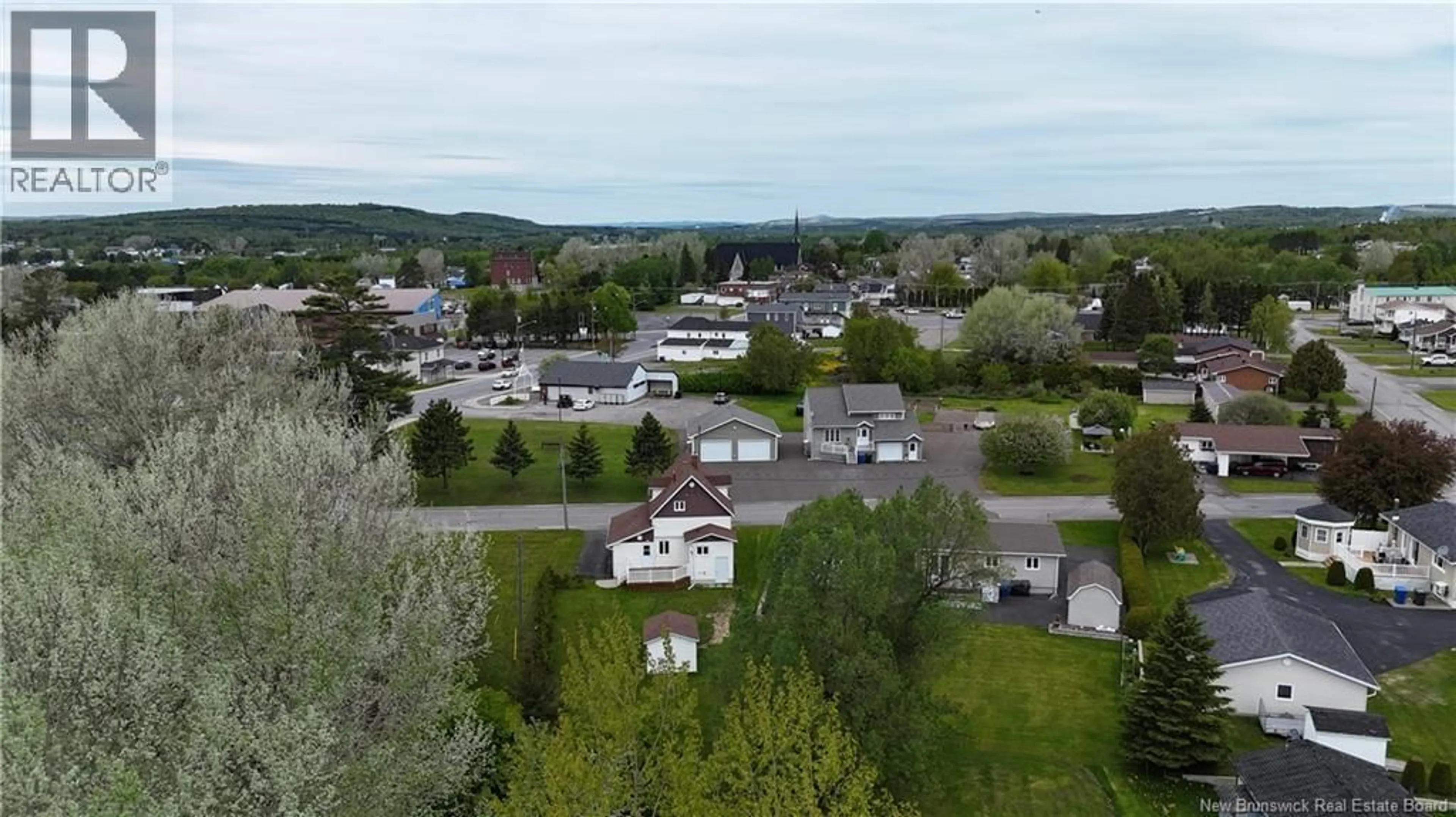 A pic from outside/outdoor area/front of a property/back of a property/a pic from drone, mountain view for 13 VIOLETTE, Saint-Léonard New Brunswick E7E1Z8