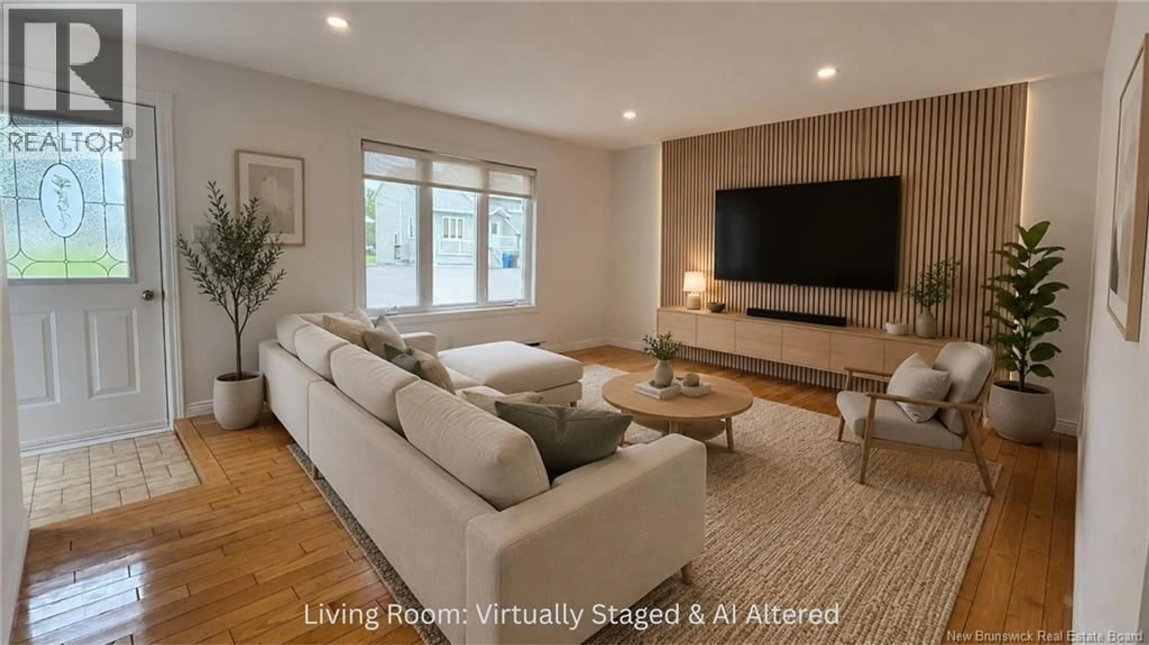 Living room with furniture, wood/laminate floor for 13 VIOLETTE, Saint-Léonard New Brunswick E7E1Z8