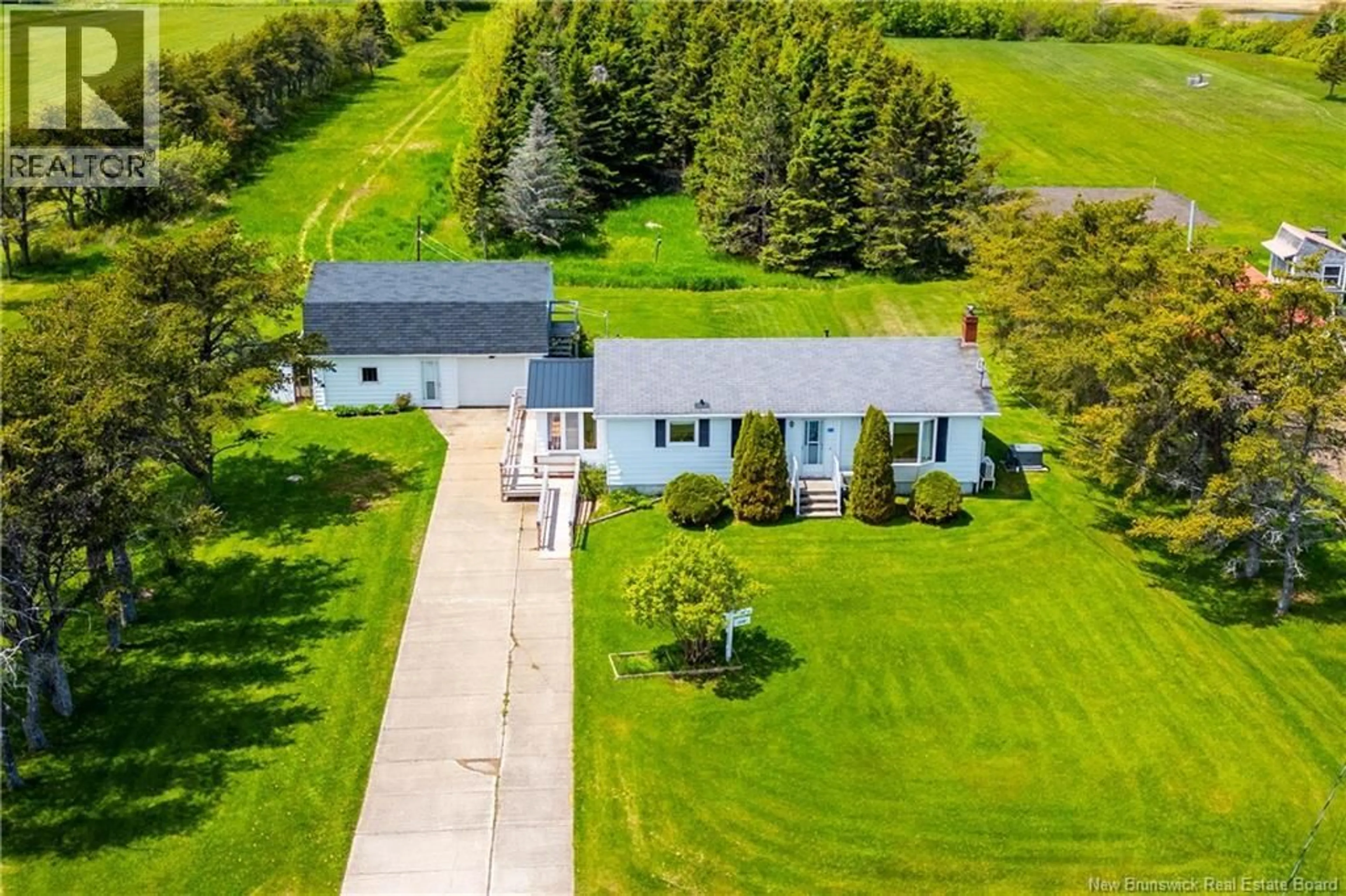 A pic from outside/outdoor area/front of a property/back of a property/a pic from drone, street for 23 MURRAY ROAD, Little Shemogue New Brunswick E4M3N8