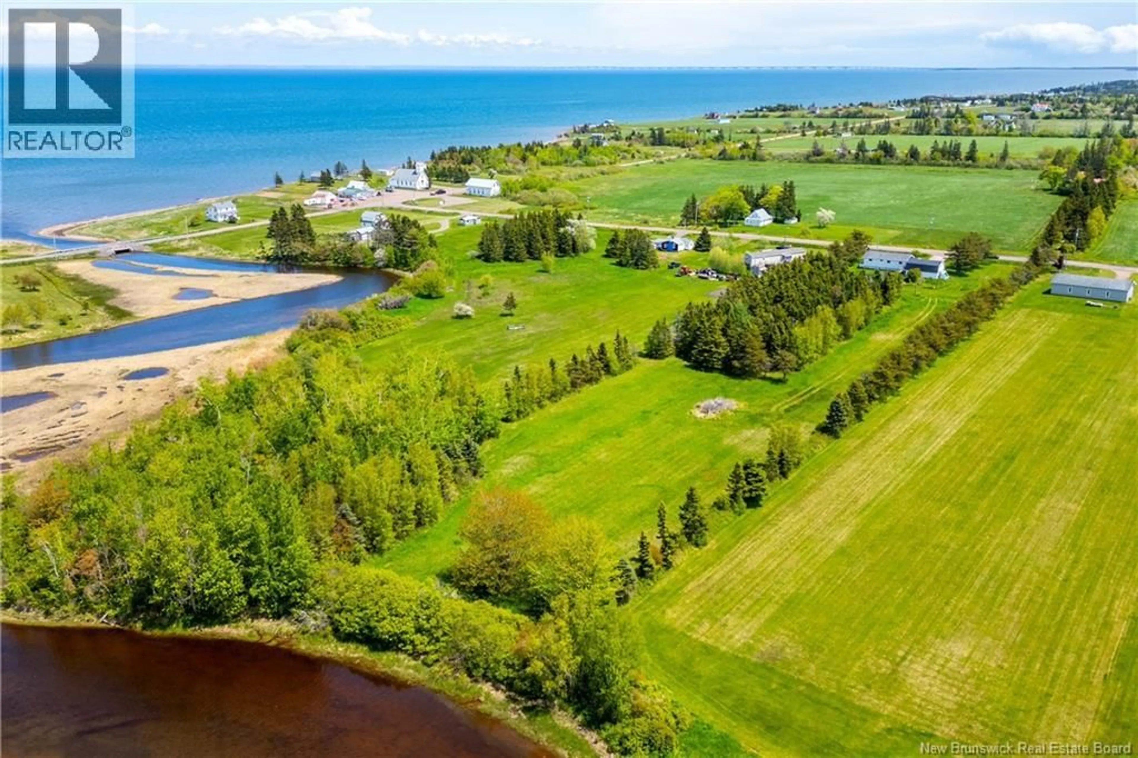A pic from outside/outdoor area/front of a property/back of a property/a pic from drone, water/lake/river/ocean view for 23 MURRAY ROAD, Little Shemogue New Brunswick E4M3N8