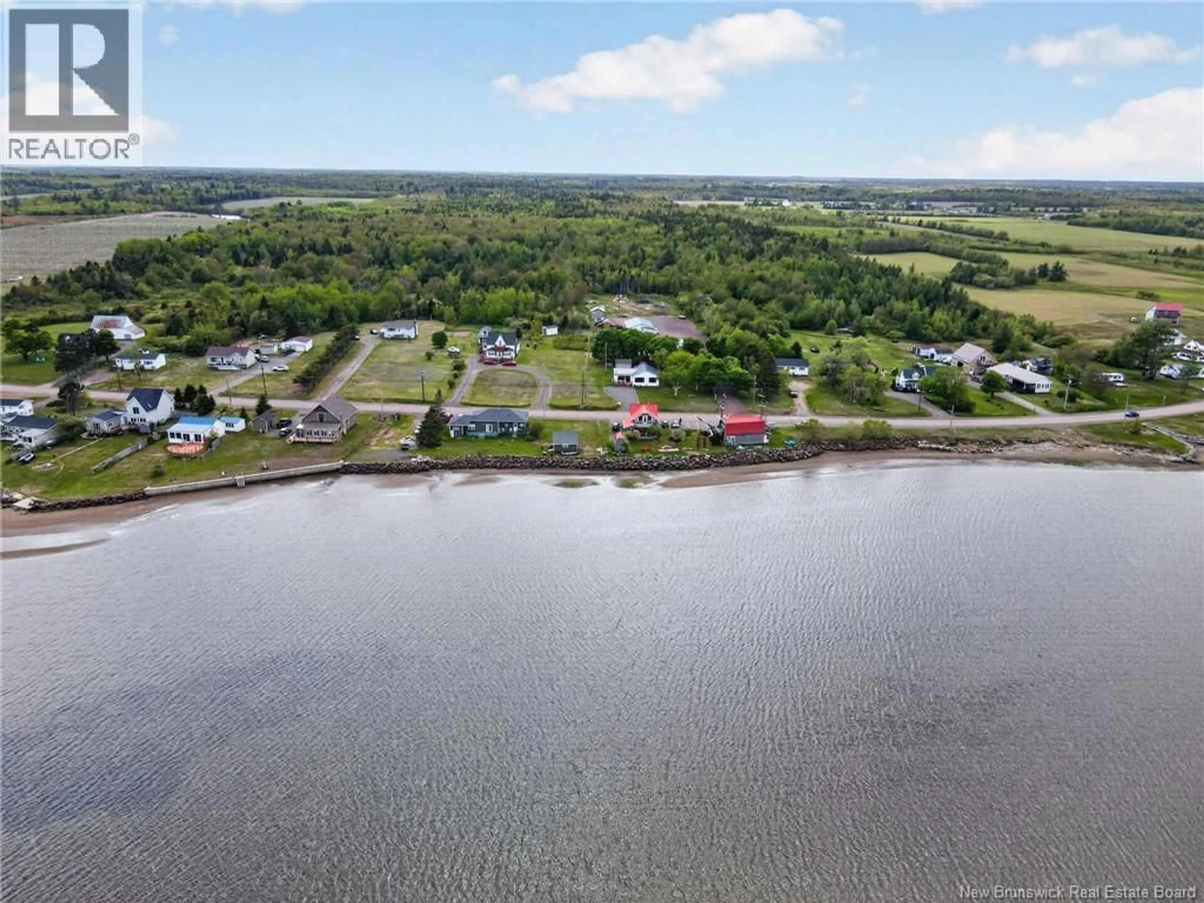 A pic from outside/outdoor area/front of a property/back of a property/a pic from drone, water/lake/river/ocean view for 1553 ROUTE 475, Bouctouche New Brunswick E4S4P6