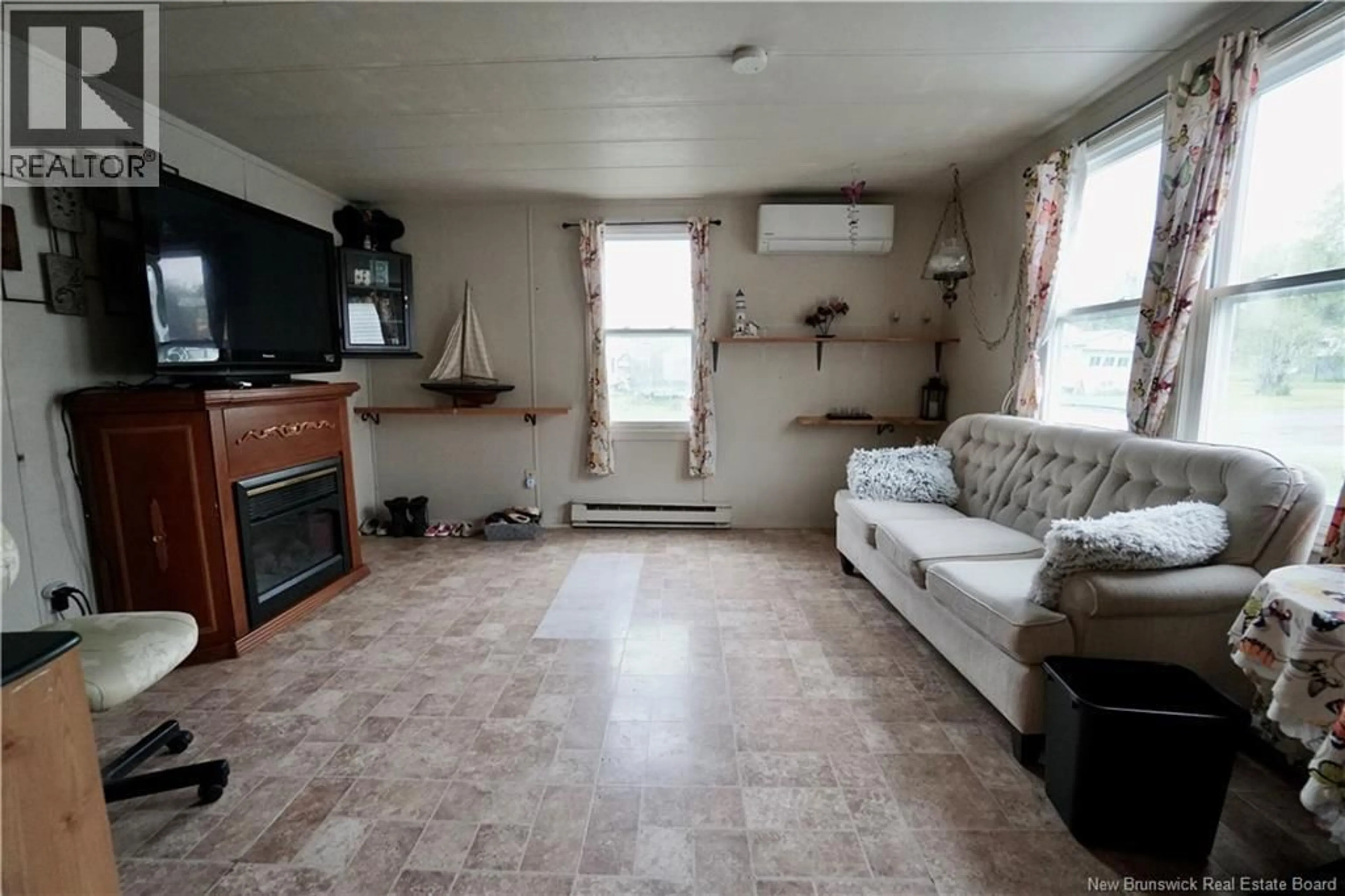 Living room with furniture, unknown for 5A EDGEWOOD STREET, St. Stephen New Brunswick E3L3C3