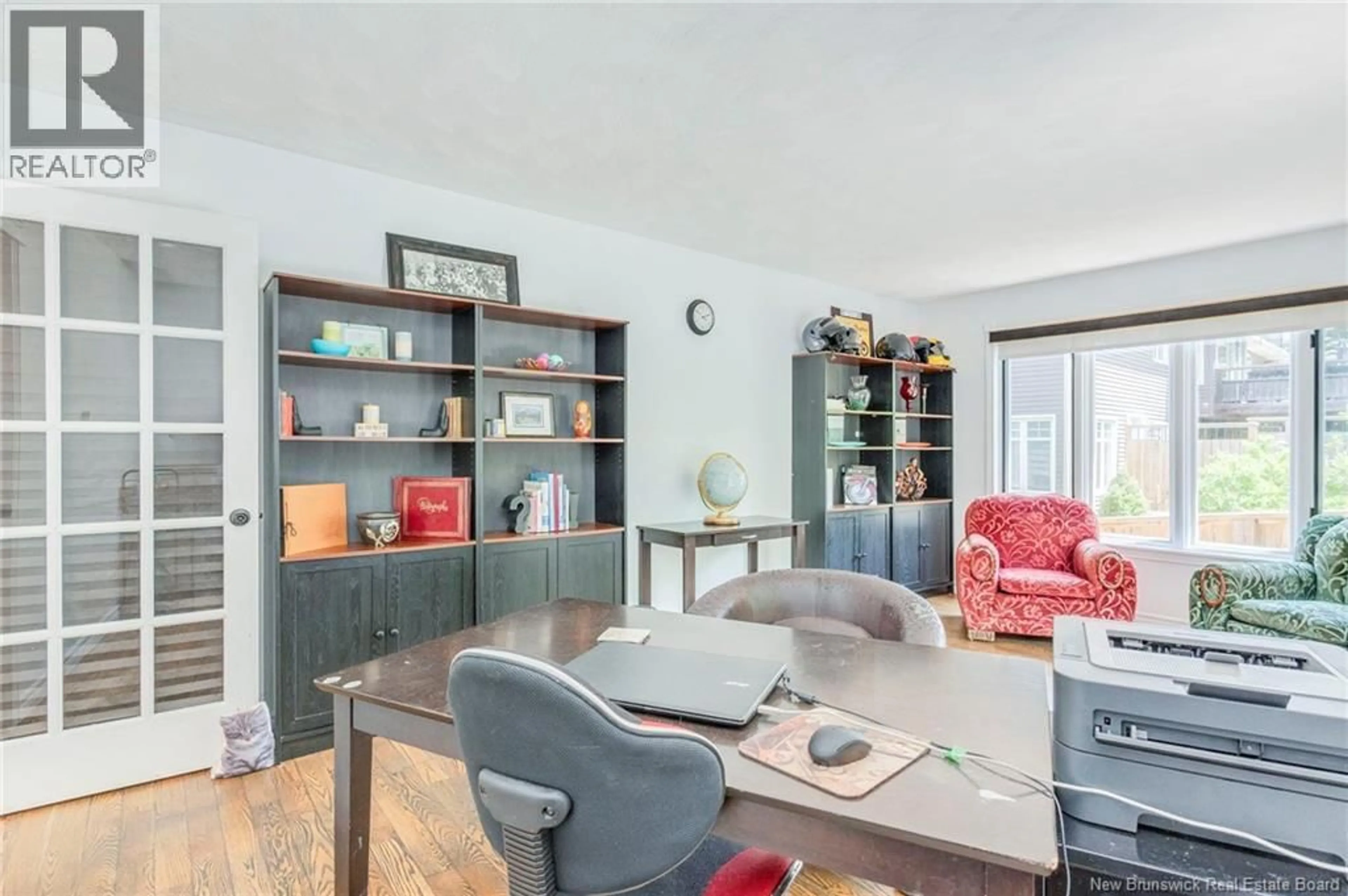 Living room with furniture, wood/laminate floor for 10 EYDIE DRIVE, Rothesay New Brunswick E2E4K2