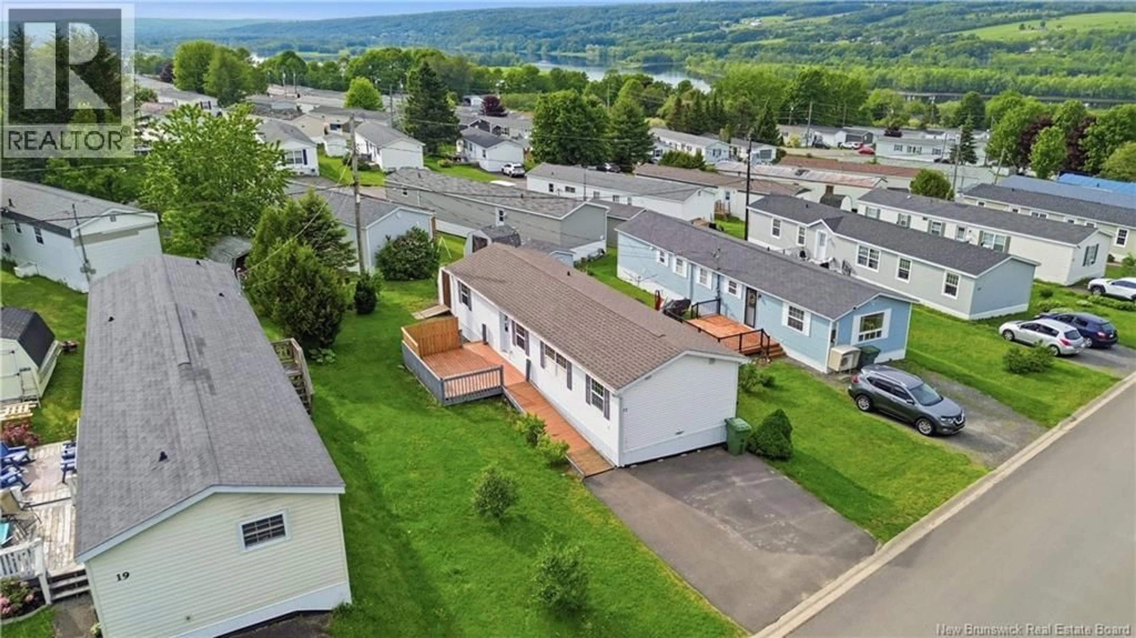 A pic from outside/outdoor area/front of a property/back of a property/a pic from drone, mountain view for 21 MACINTOSH STREET, Fredericton New Brunswick E3C1L8