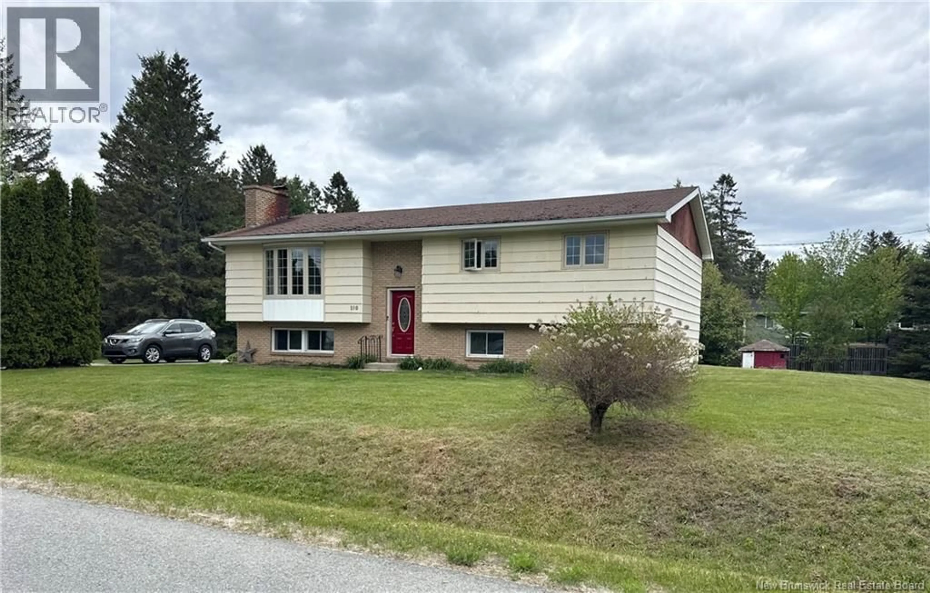 Home with vinyl exterior material, street for 180 HUTCHISON DRIVE, Miramichi New Brunswick E1V6C2