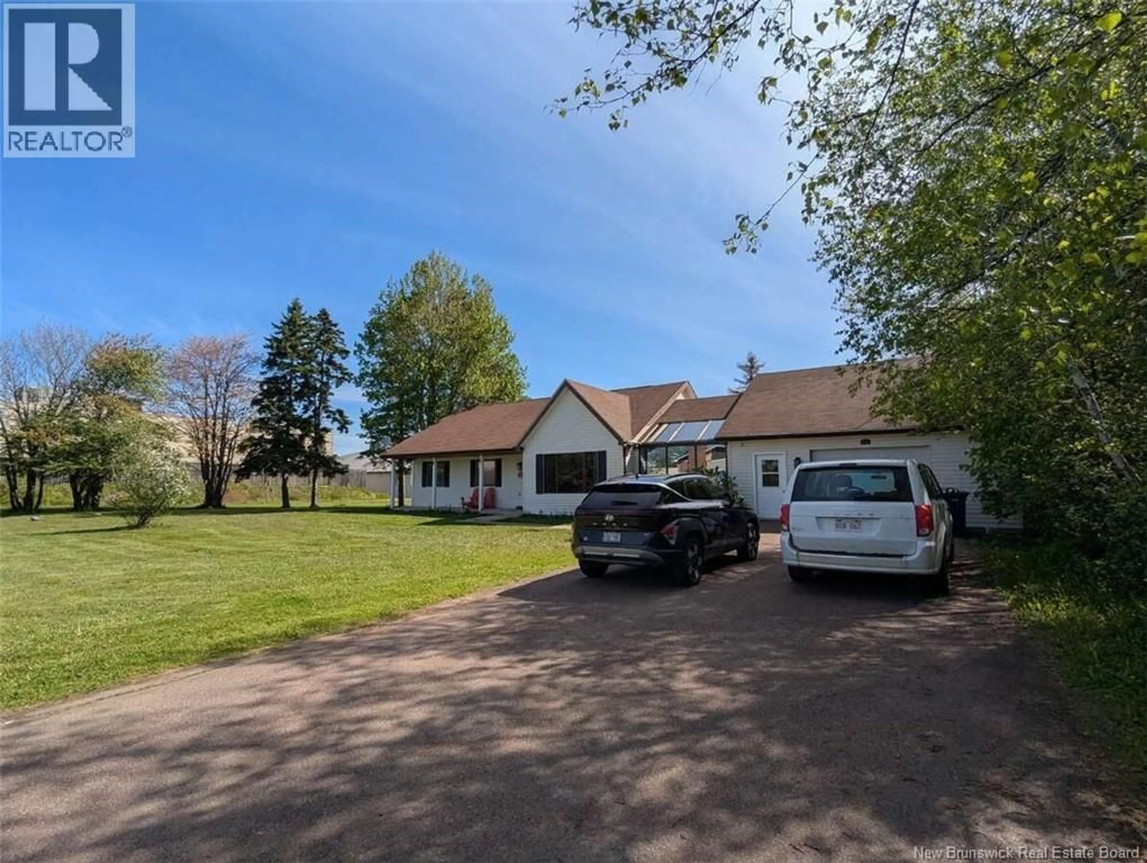 A pic from outside/outdoor area/front of a property/back of a property/a pic from drone, street for 62 BATEMAN PROMENADE, Shediac New Brunswick E4P1G2