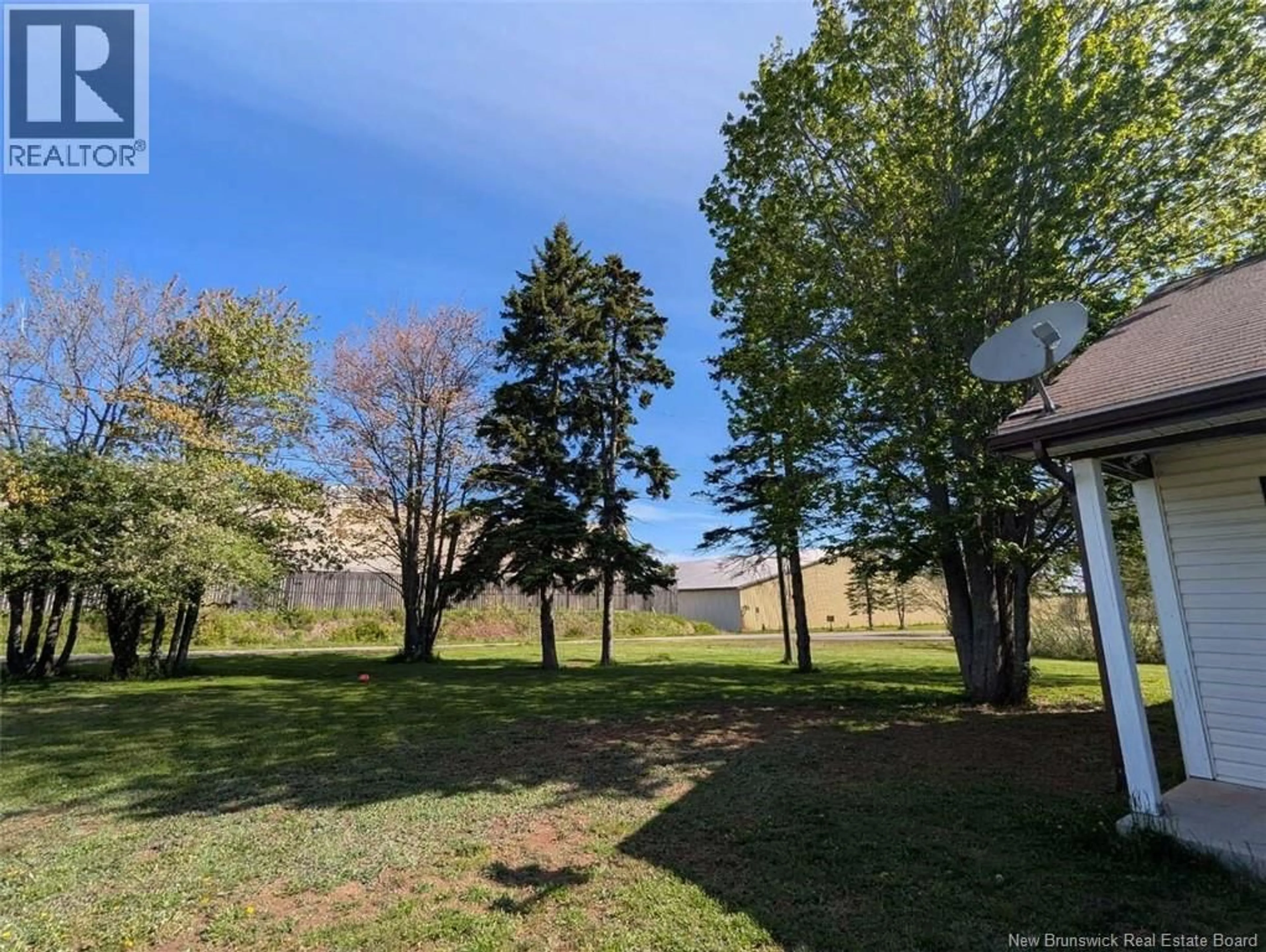 A pic from outside/outdoor area/front of a property/back of a property/a pic from drone, forest/trees view for 62 BATEMAN PROMENADE, Shediac New Brunswick E4P1G2