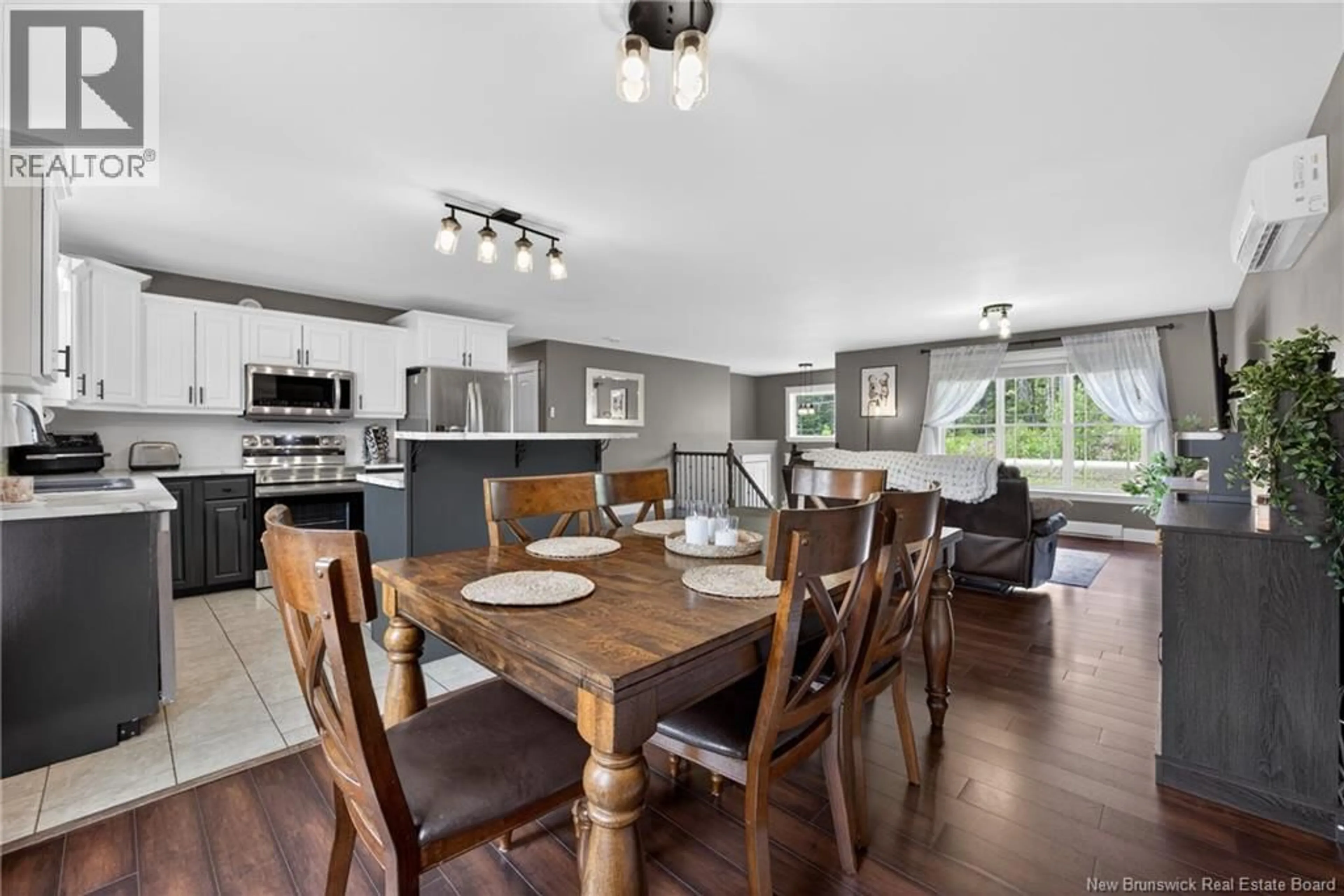 Open concept kitchen, wood/laminate floor for 14 CHARDONNAY STREET, Fredericton New Brunswick E3A0A7