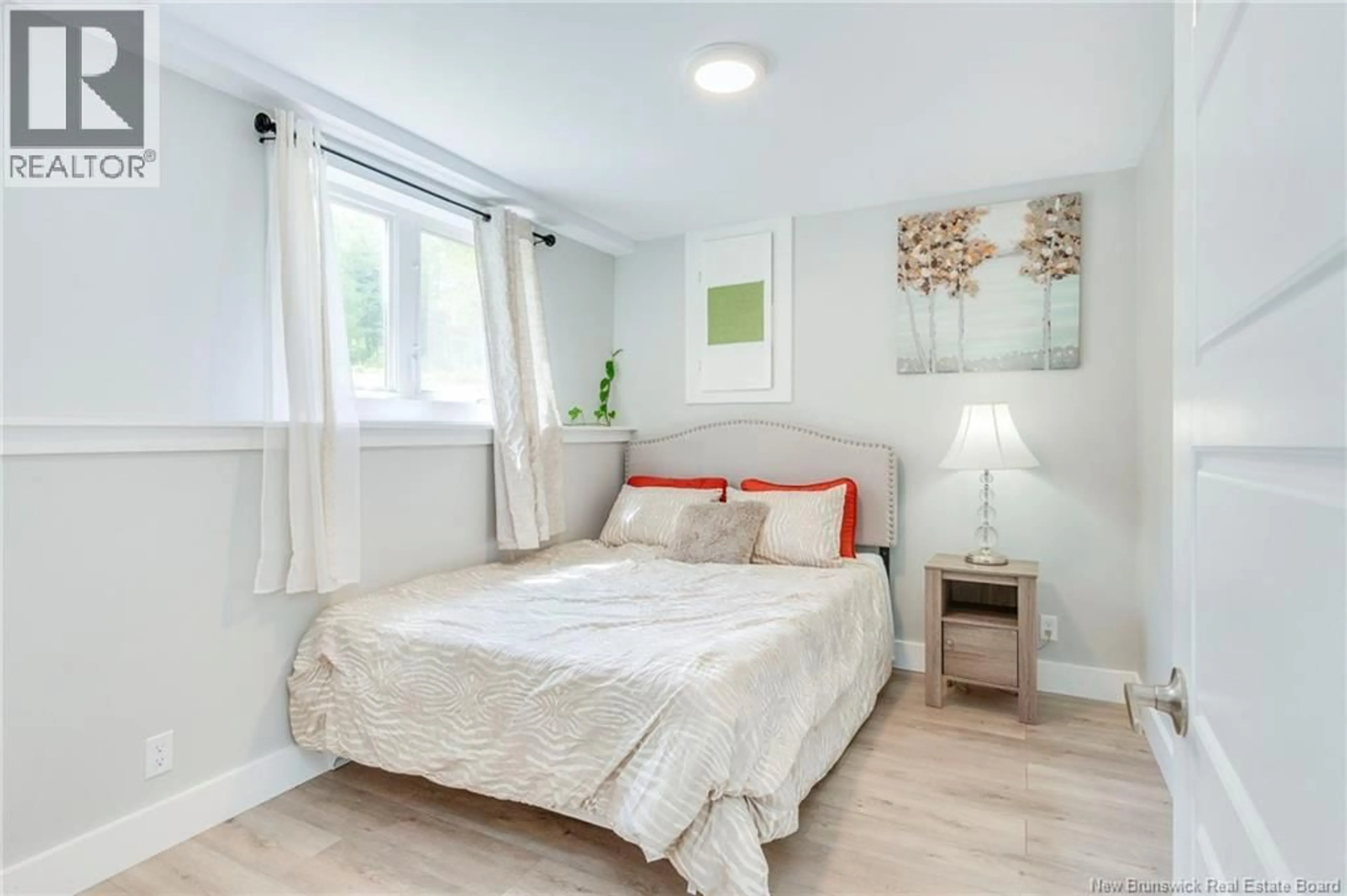 Bedroom with bed, wood/laminate floor for 58 SHANKLIN ROAD, Bains Corner New Brunswick E5R1R9
