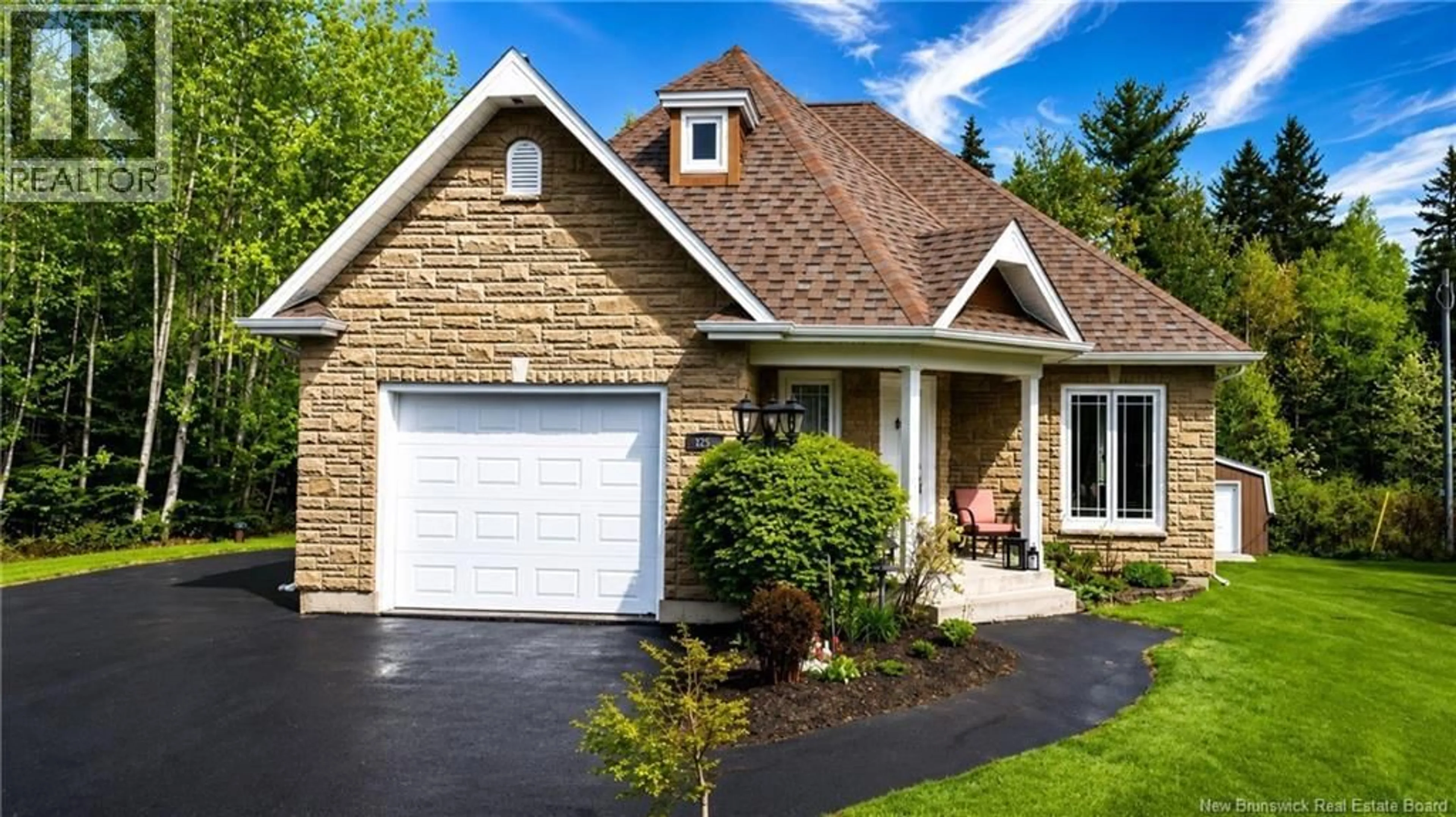 Home with brick exterior material, street for 502 WOODLAND DRIVE, North Tetagouche New Brunswick E2A4Z1