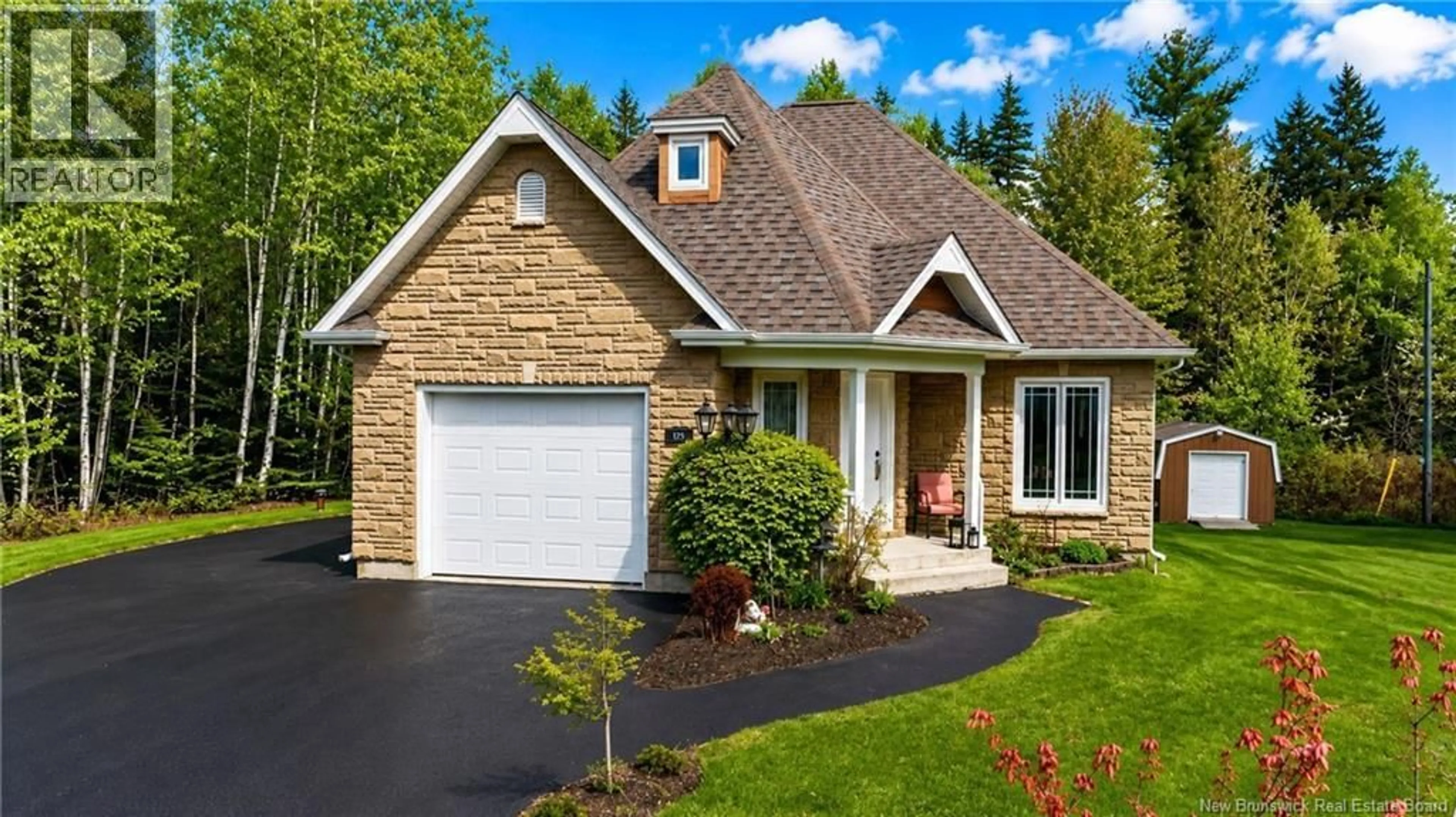 Home with brick exterior material, street for 502 WOODLAND DRIVE, North Tetagouche New Brunswick E2A4Z1