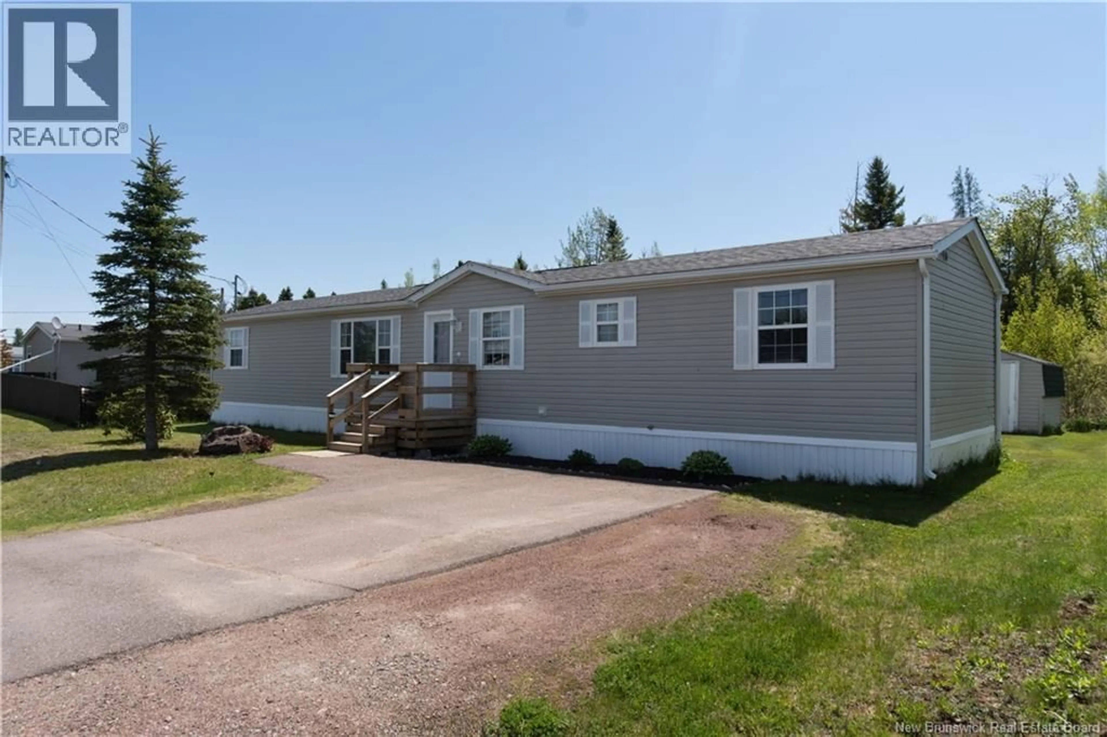 Home with vinyl exterior material, street for 68 HAYWARD LANE, Riverview New Brunswick E1B5R2