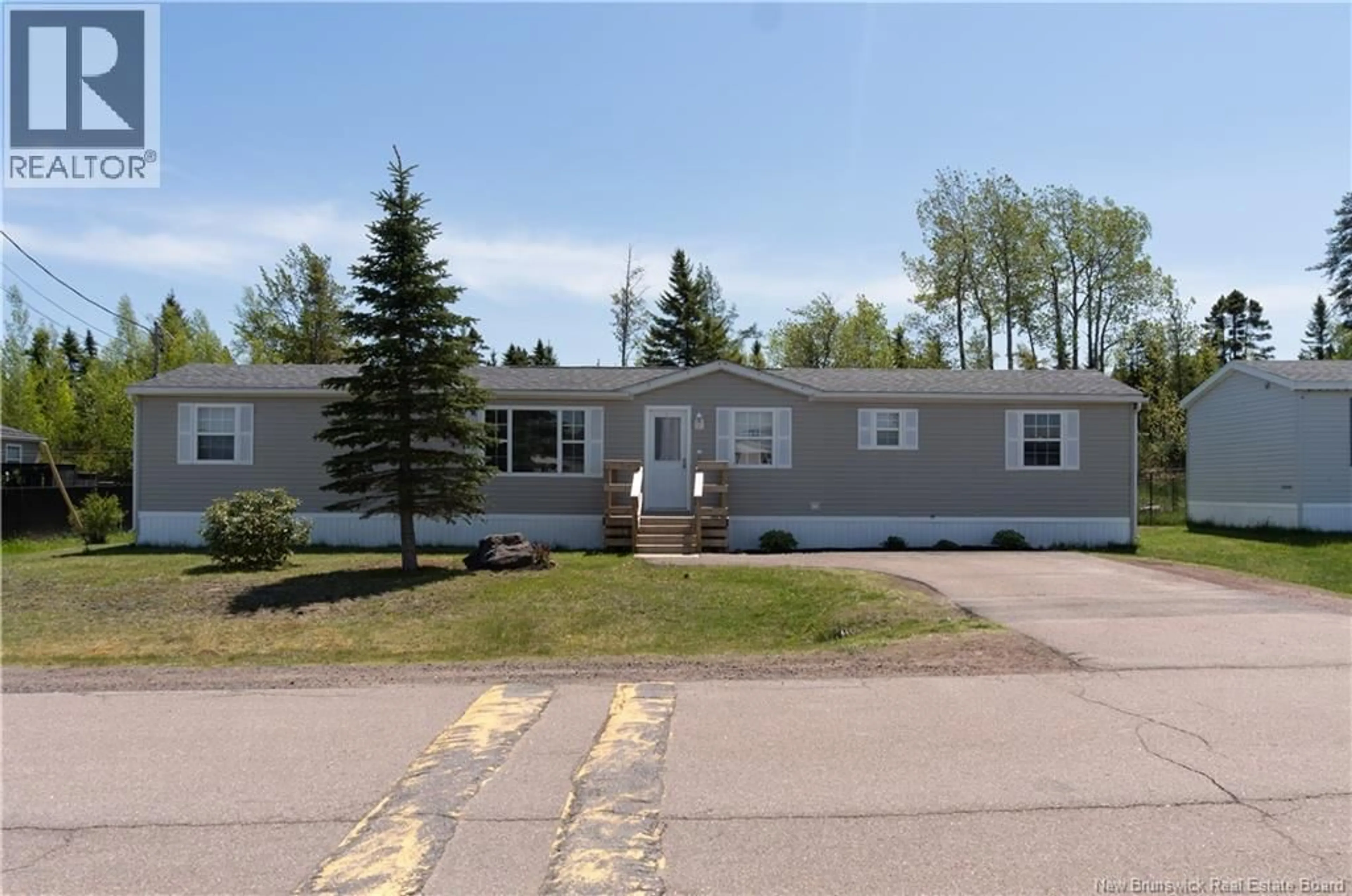 Home with vinyl exterior material, street for 68 HAYWARD LANE, Riverview New Brunswick E1B5R2