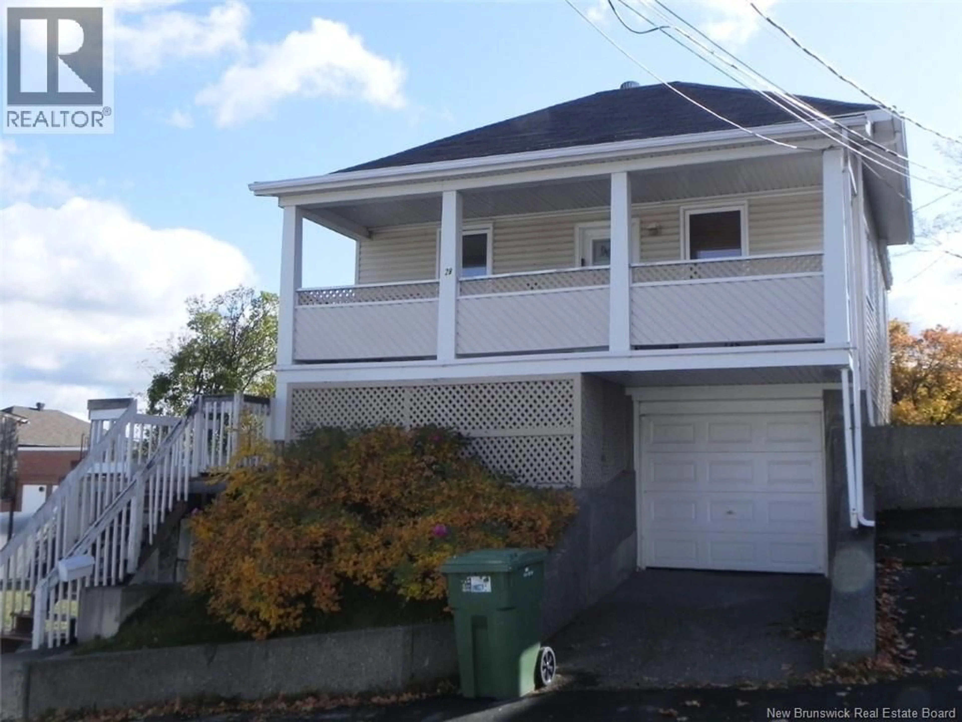 Home with vinyl exterior material, street for 28 LYNOTT STREET, Edmundston New Brunswick E3V1S6