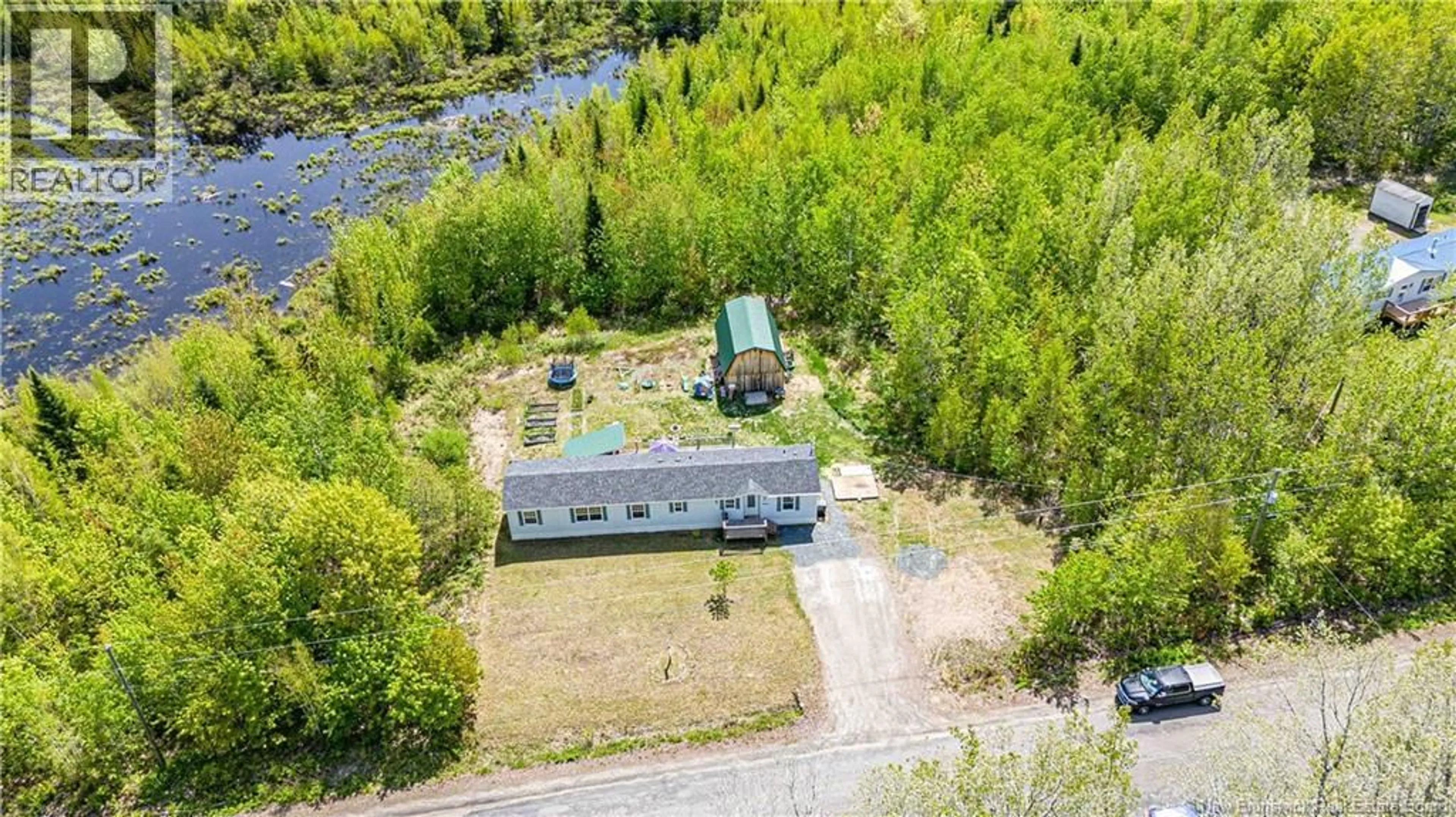A pic from outside/outdoor area/front of a property/back of a property/a pic from drone, water/lake/river/ocean view for 1388 POST ROAD, Rusagonis New Brunswick E3B7Y2