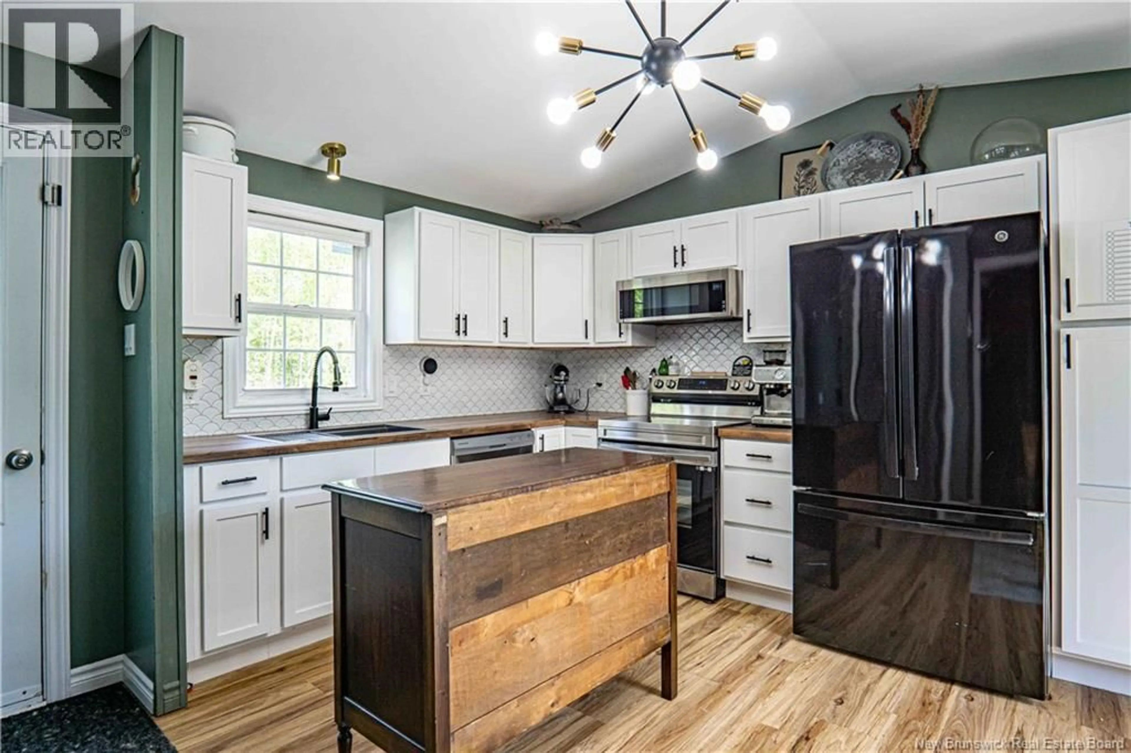 Open concept kitchen, wood/laminate floor for 1388 POST ROAD, Rusagonis New Brunswick E3B7Y2