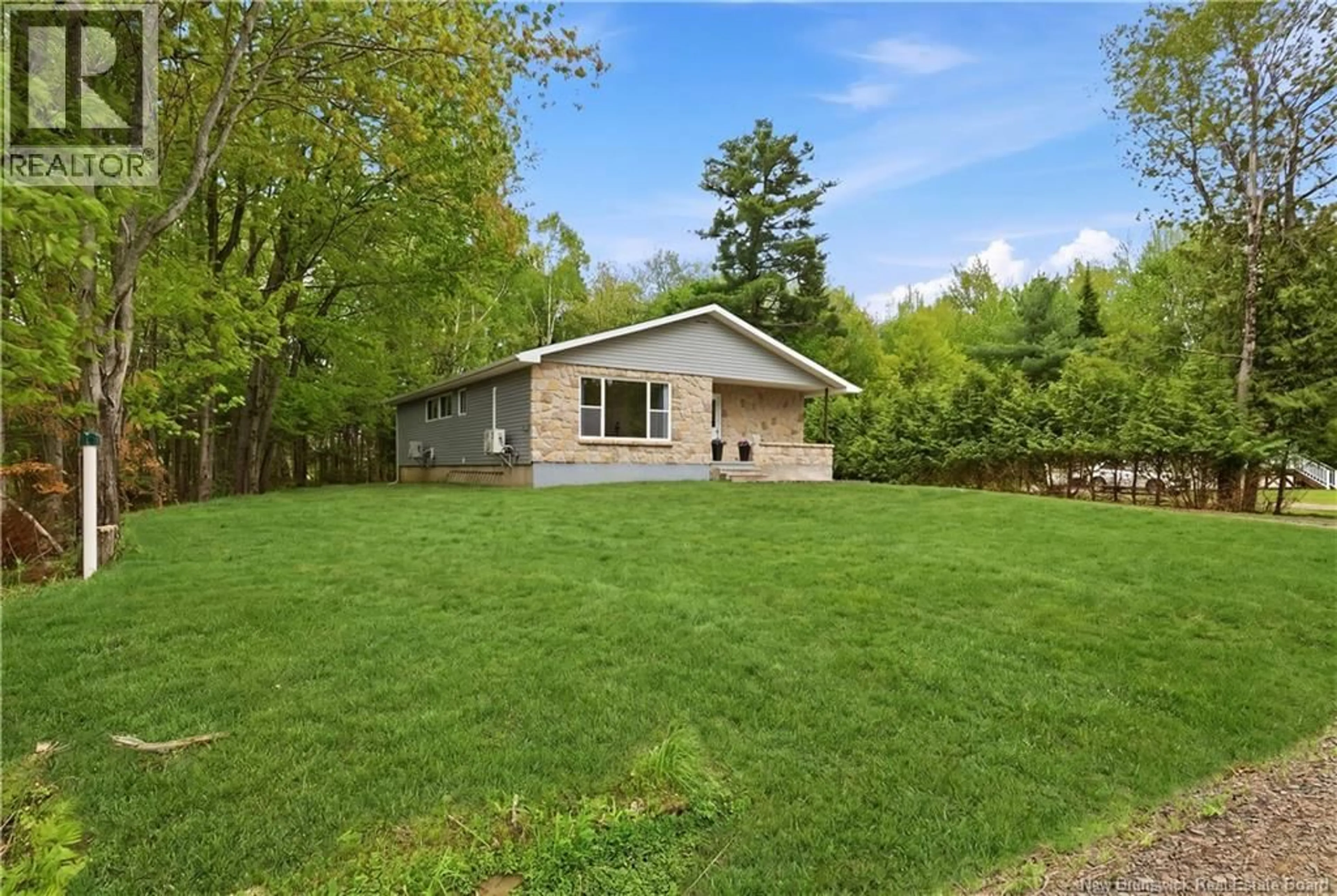 A pic from outside/outdoor area/front of a property/back of a property/a pic from drone, unknown for 23 NEVERS ROAD, Lincoln New Brunswick E3B8R7
