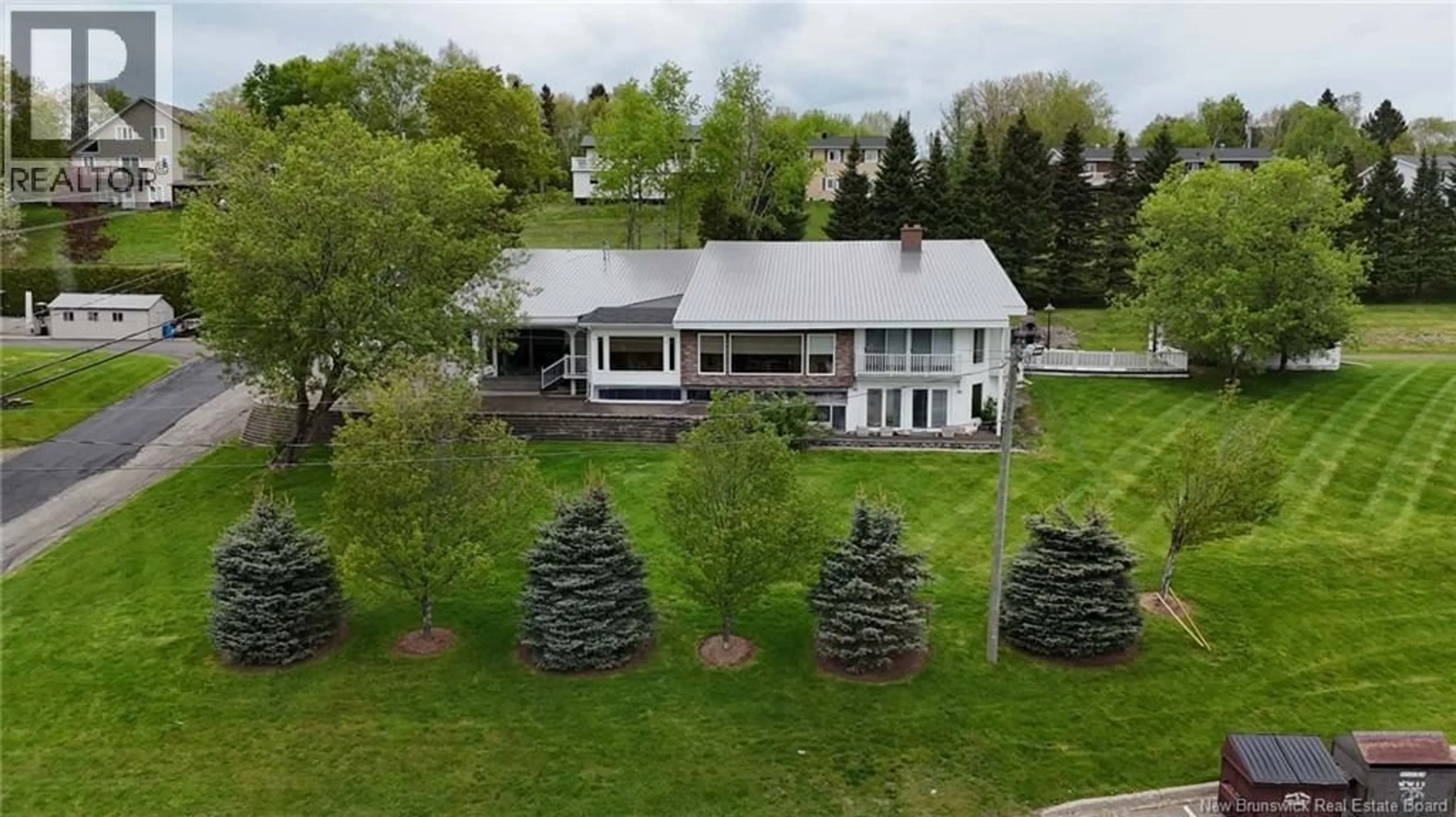 A pic from outside/outdoor area/front of a property/back of a property/a pic from drone, unknown for 24 RUE VETERAN SUD, Grand Falls New Brunswick E3Y0E6