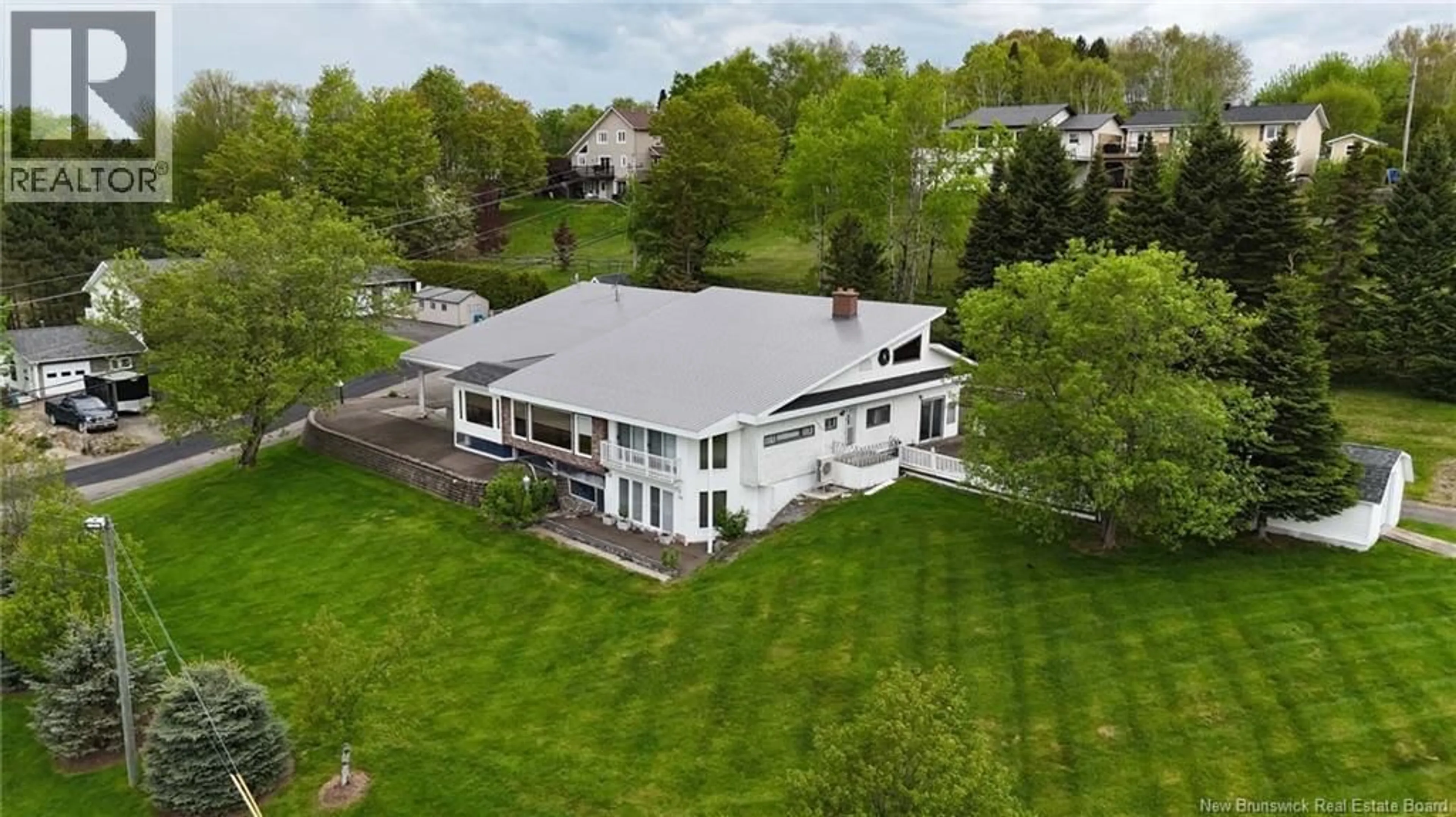 A pic from outside/outdoor area/front of a property/back of a property/a pic from drone, unknown for 24 RUE VETERAN SUD, Grand Falls New Brunswick E3Y0E6