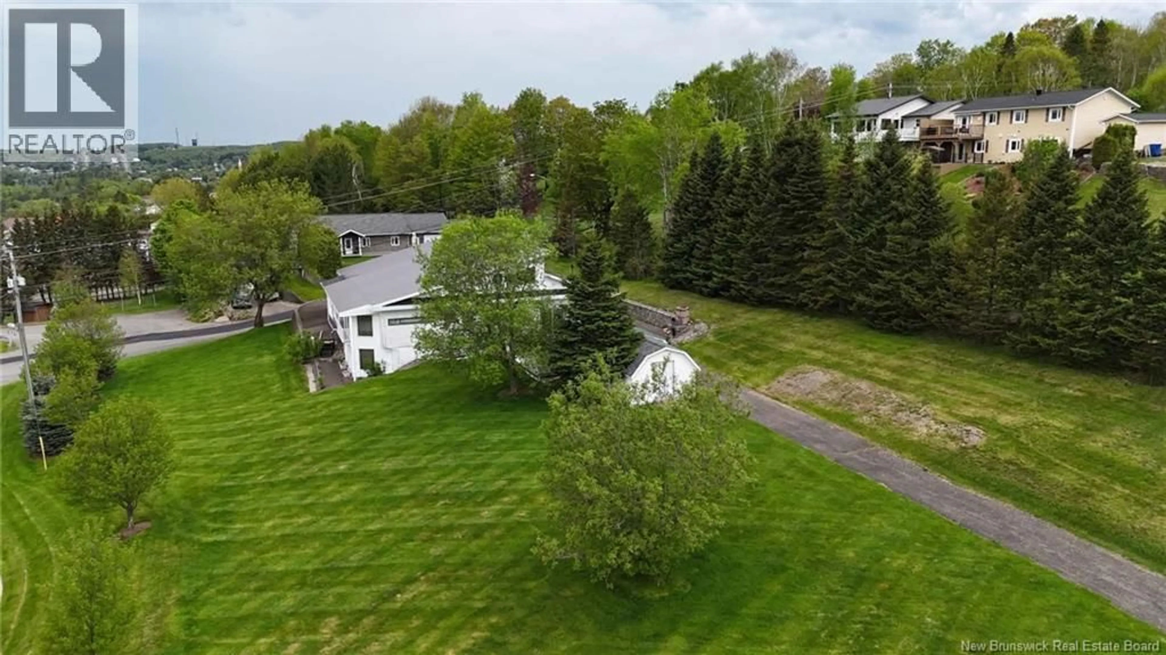 A pic from outside/outdoor area/front of a property/back of a property/a pic from drone, unknown for 24 RUE VETERAN SUD, Grand Falls New Brunswick E3Y0E6