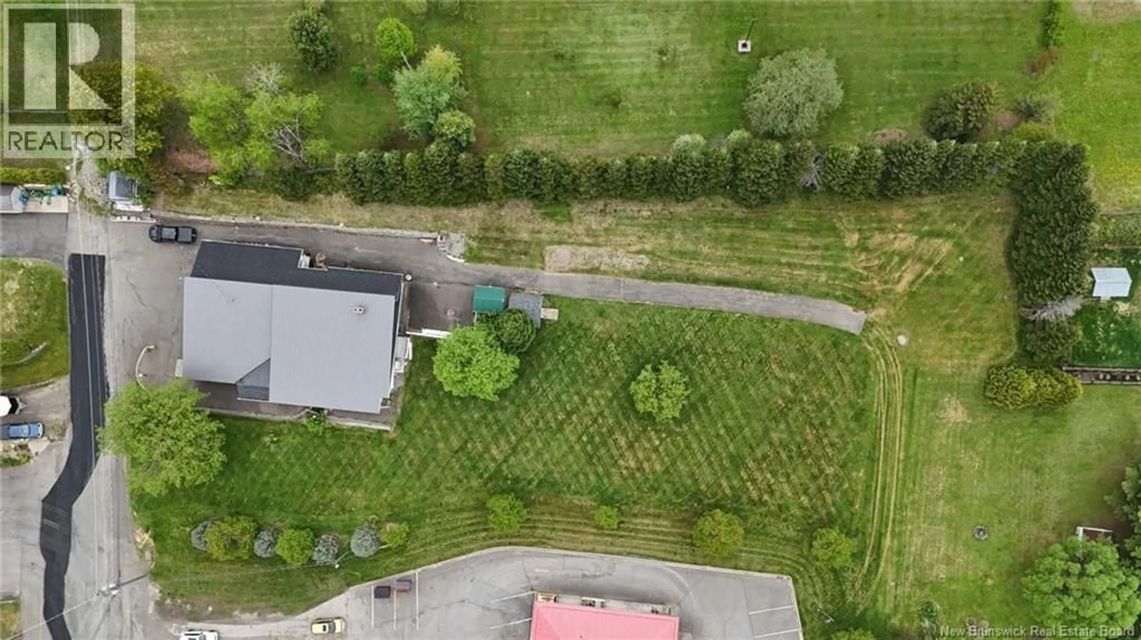 A pic from outside/outdoor area/front of a property/back of a property/a pic from drone, unknown for 24 RUE VETERAN SUD, Grand Falls New Brunswick E3Y0E6