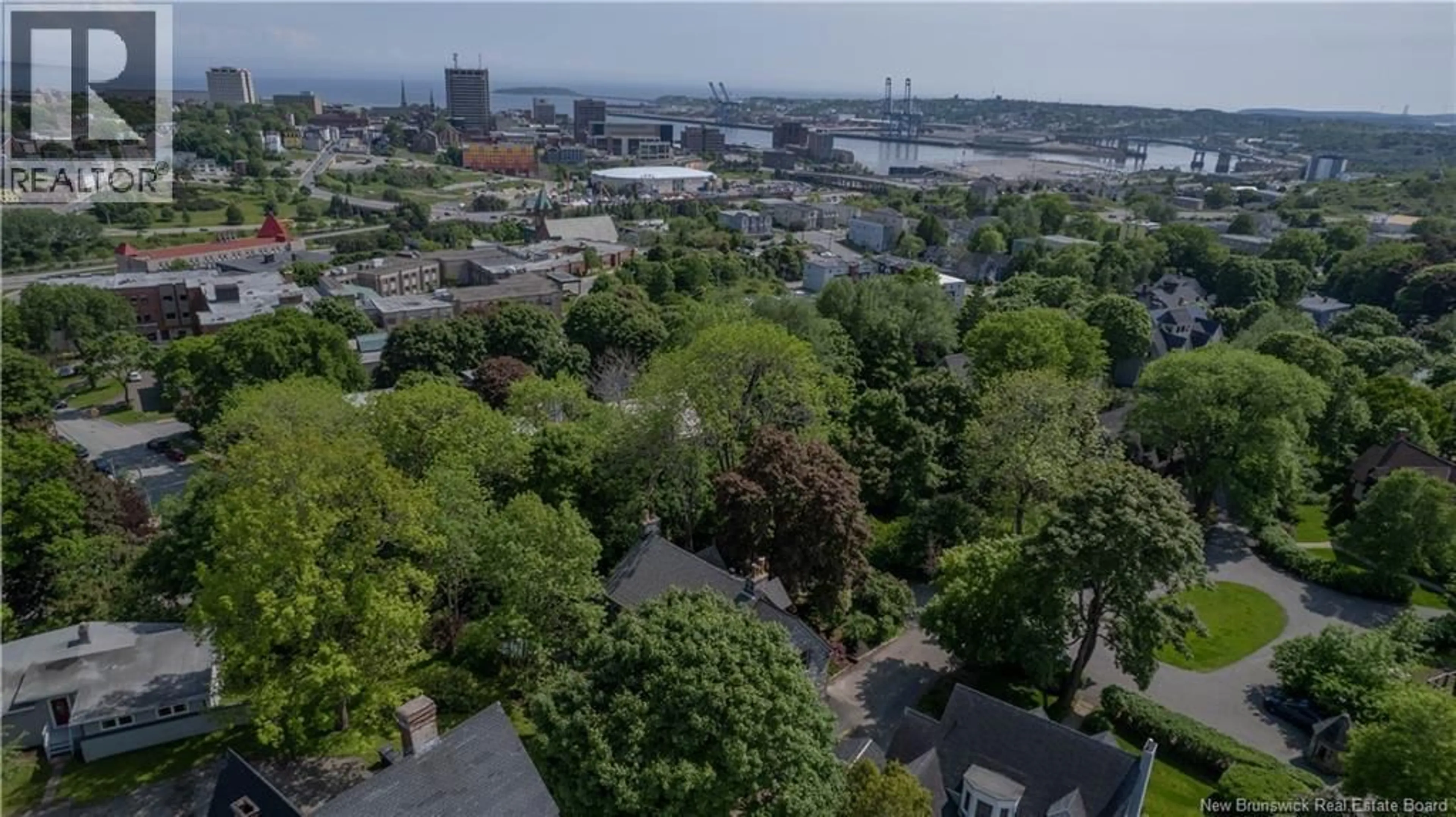 A pic from outside/outdoor area/front of a property/back of a property/a pic from drone, city buildings view from balcony for 4 DUNCRAGGAN COURT, Saint John New Brunswick E2K3T3