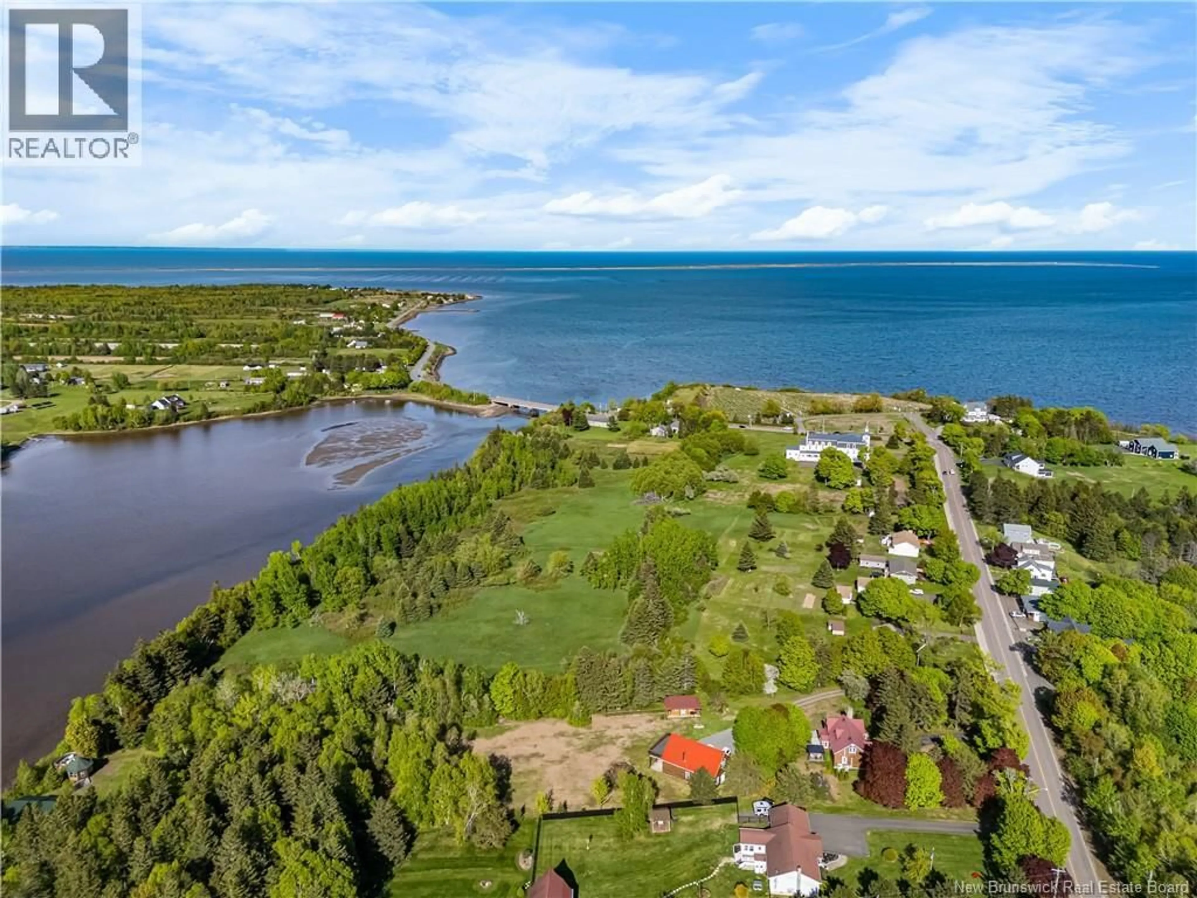 A pic from outside/outdoor area/front of a property/back of a property/a pic from drone, water/lake/river/ocean view for 124 DU COUVENT, Bouctouche New Brunswick E4S3C1