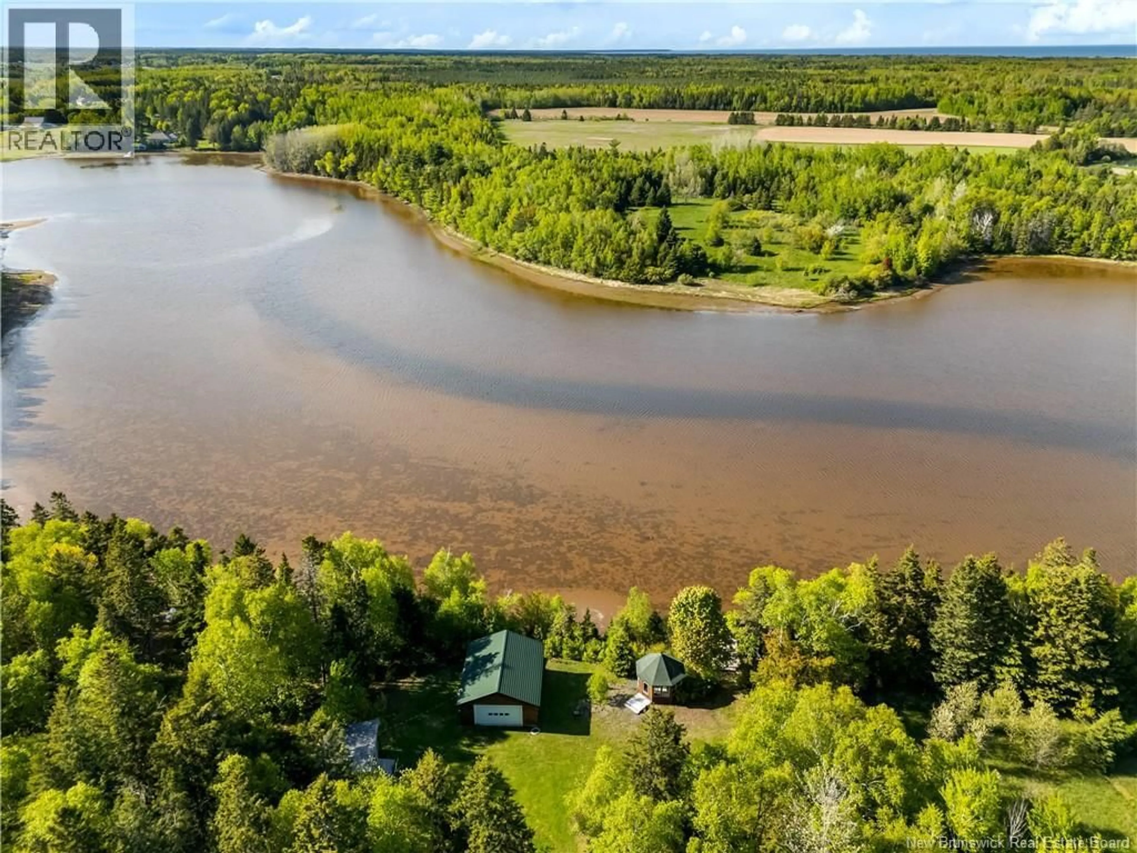 A pic from outside/outdoor area/front of a property/back of a property/a pic from drone, water/lake/river/ocean view for 124 DU COUVENT, Bouctouche New Brunswick E4S3C1