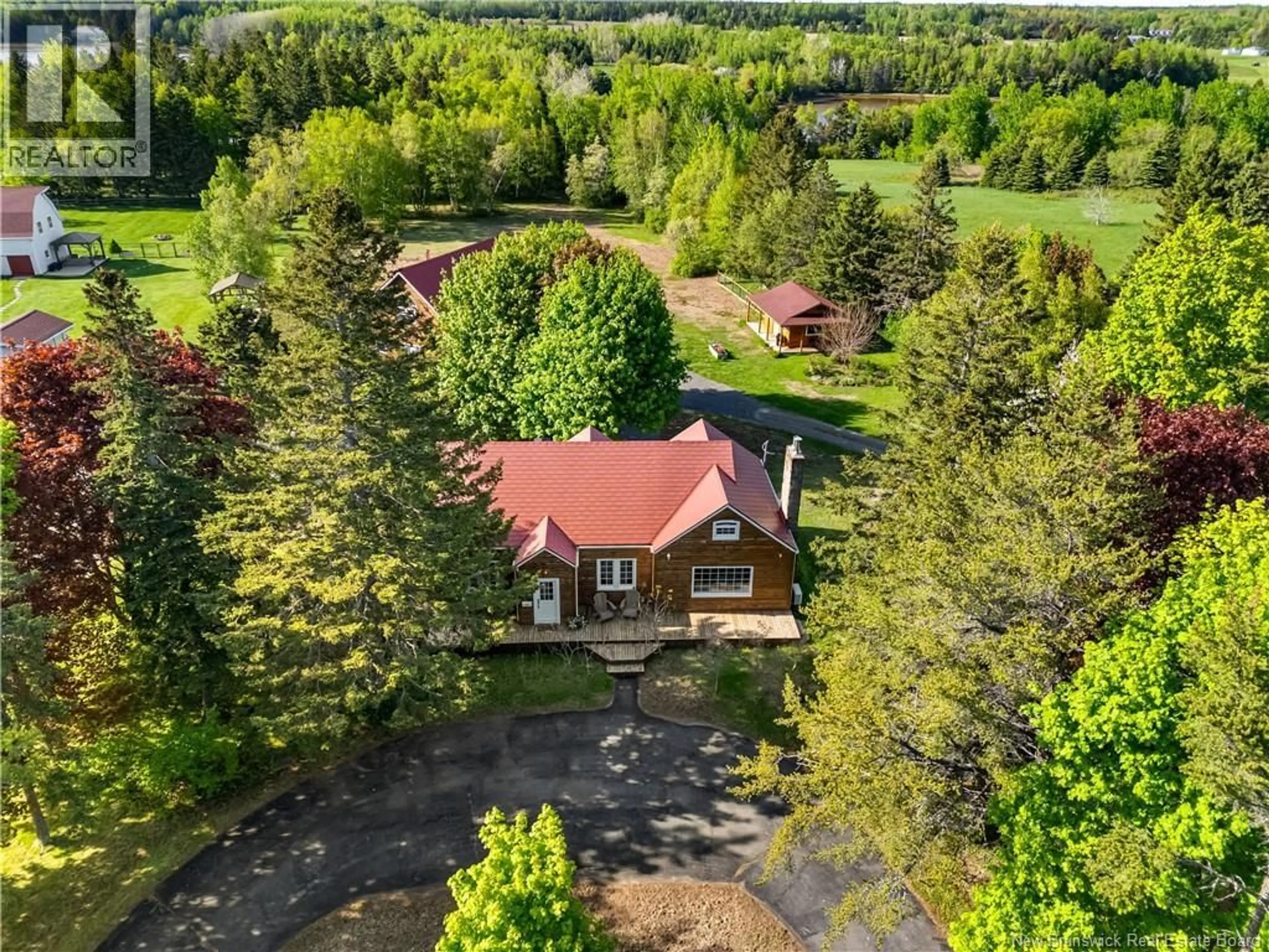 A pic from outside/outdoor area/front of a property/back of a property/a pic from drone, forest/trees view for 124 DU COUVENT, Bouctouche New Brunswick E4S3C1