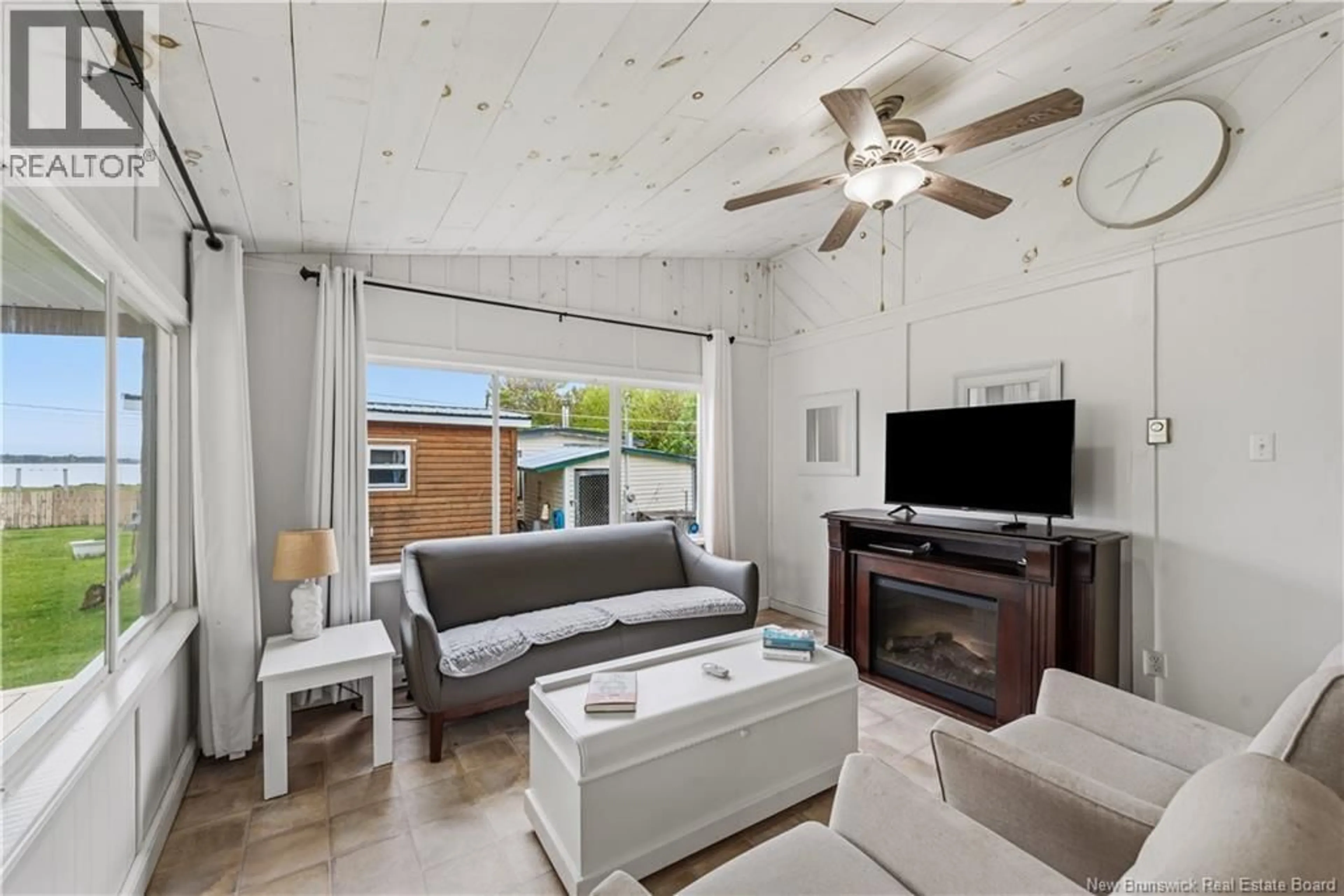 Living room with furniture, unknown for 148 HAPPY DAYS ESTATES ROAD, Shediac New Brunswick E4R4L6