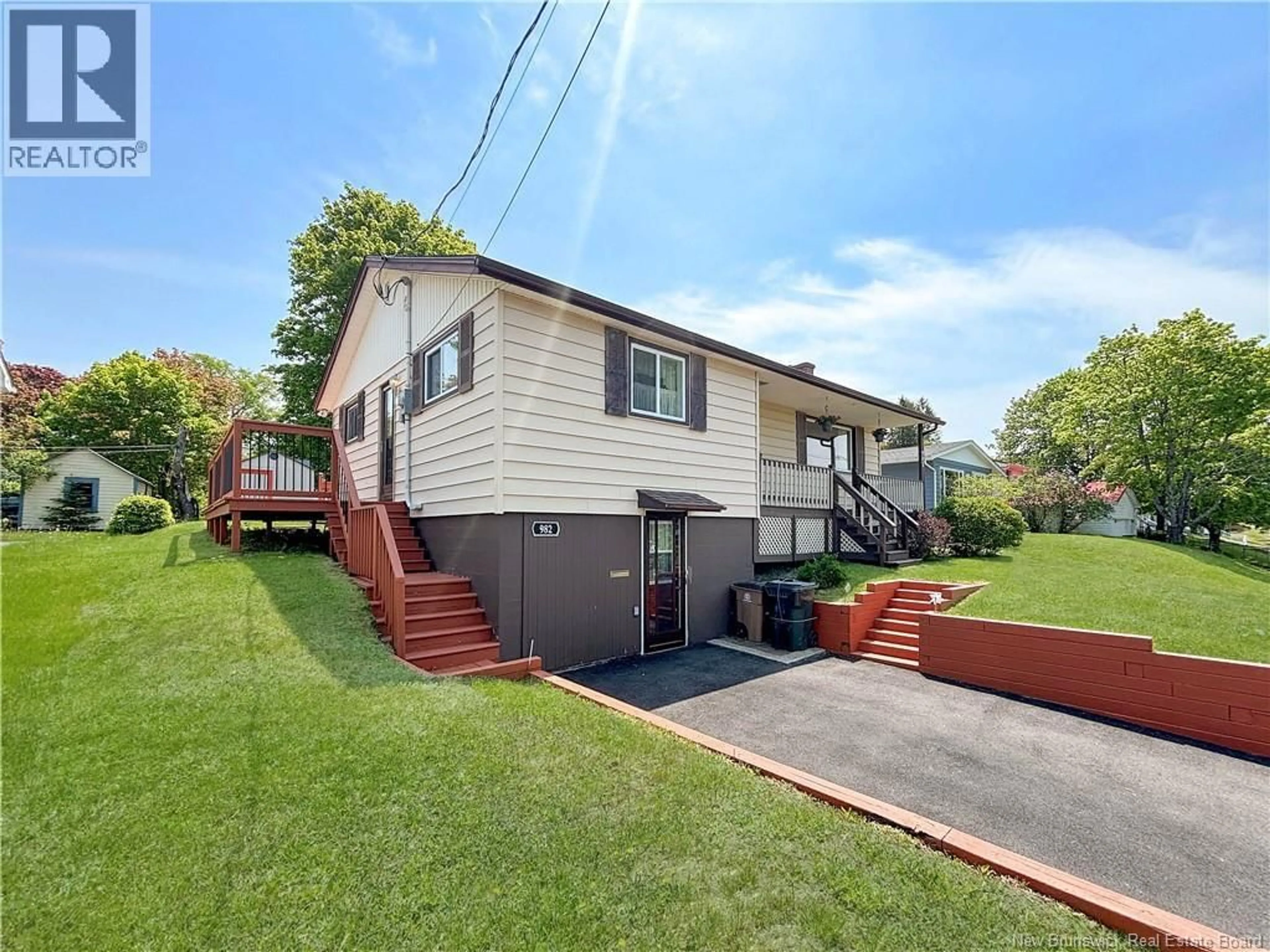 Home with vinyl exterior material, street for 982 MCCAVOUR DRIVE, Saint John New Brunswick E2M4M3