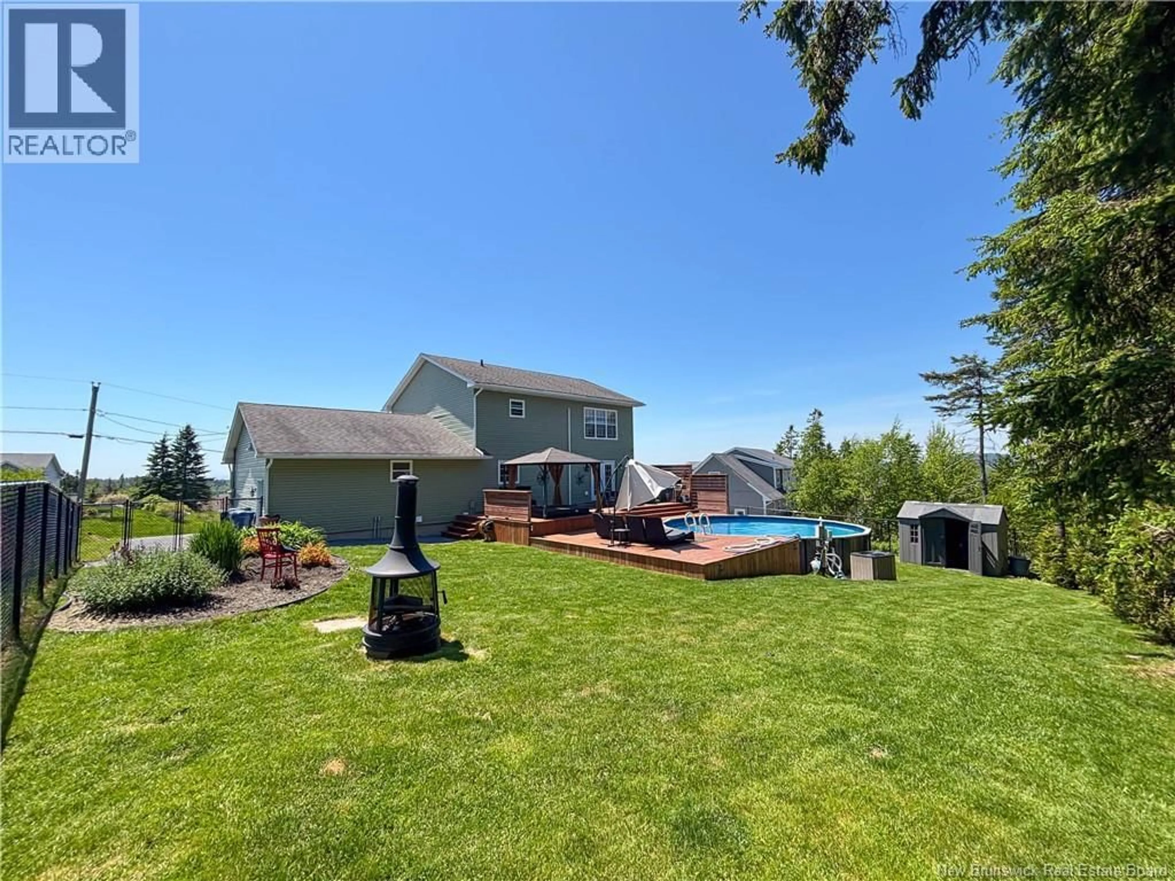 A pic from outside/outdoor area/front of a property/back of a property/a pic from drone, water/lake/river/ocean view for 11 FIELDCREST DRIVE, Quispamsis New Brunswick E2G0E4
