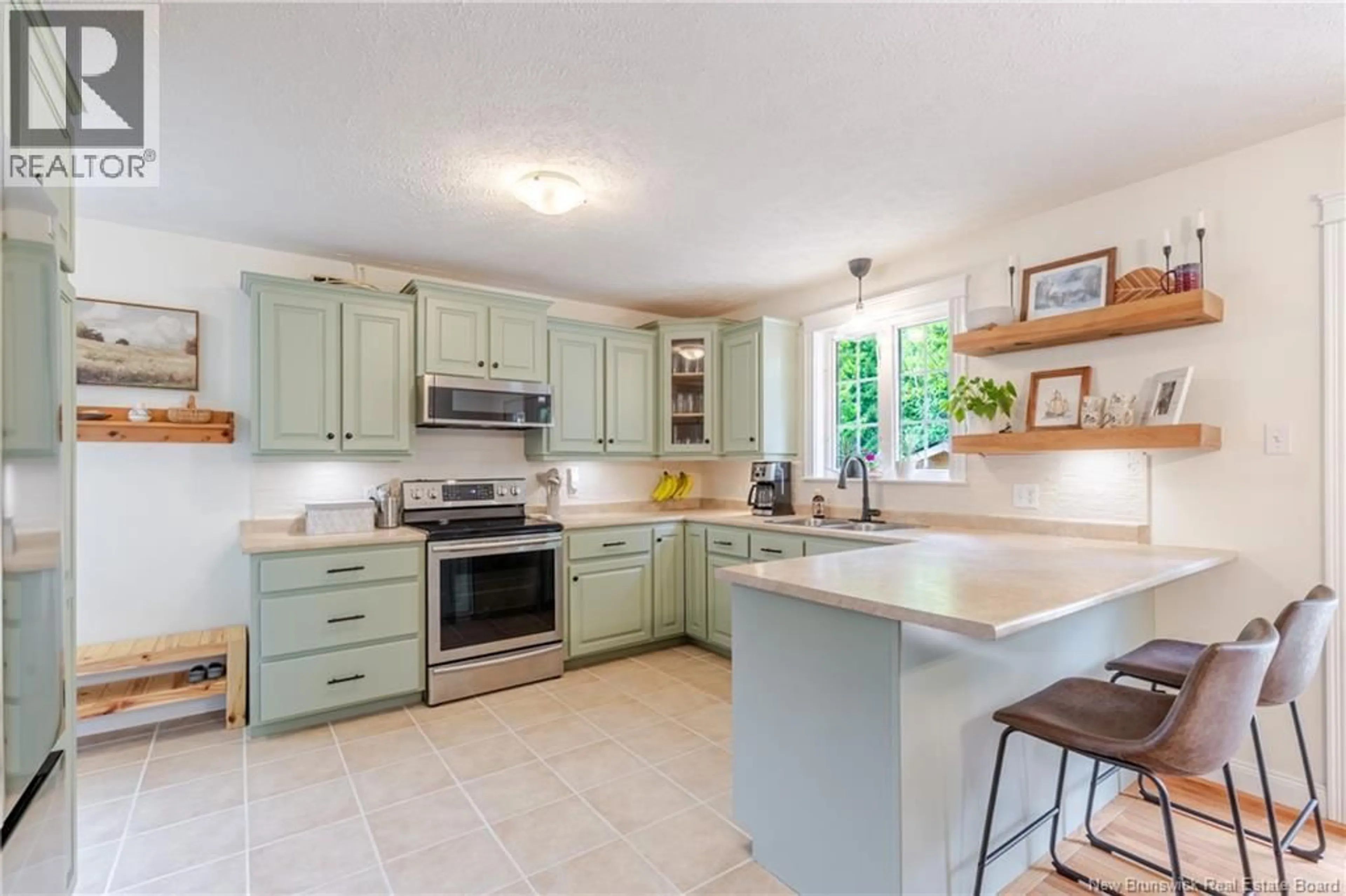 Open concept kitchen, ceramic/tile floor for 157 BUNKER STREET, Fredericton New Brunswick E3A0T1