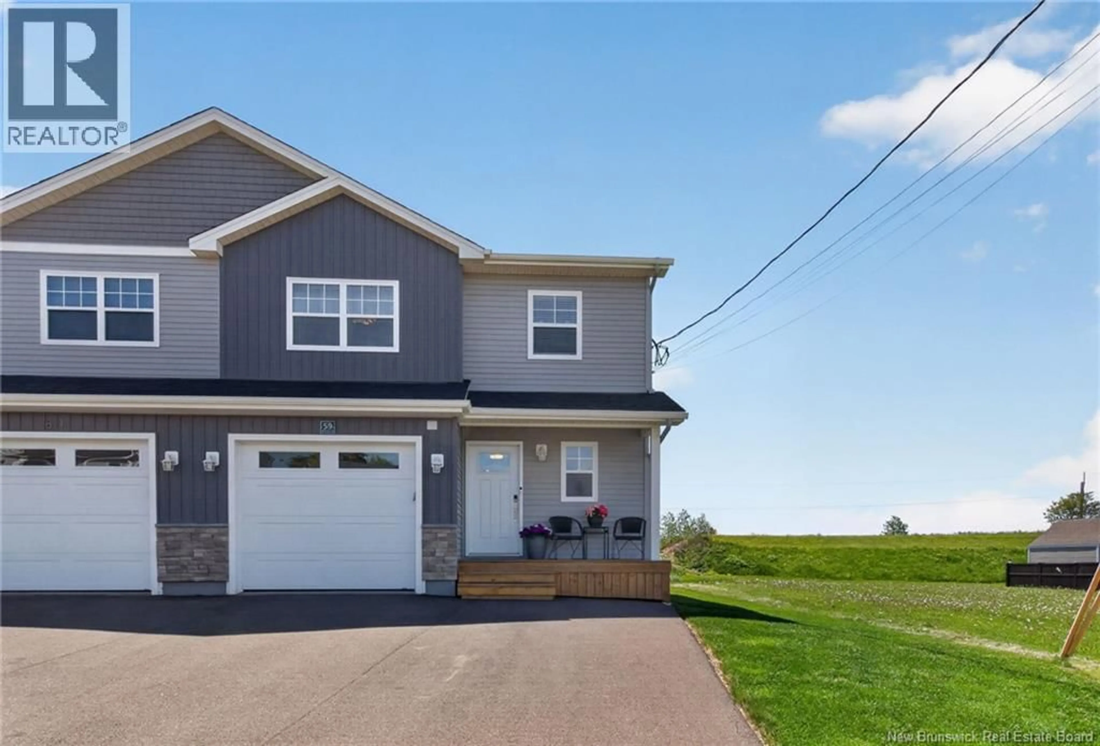 Home with vinyl exterior material, street for 59 WARNER, Moncton New Brunswick E1A5T3