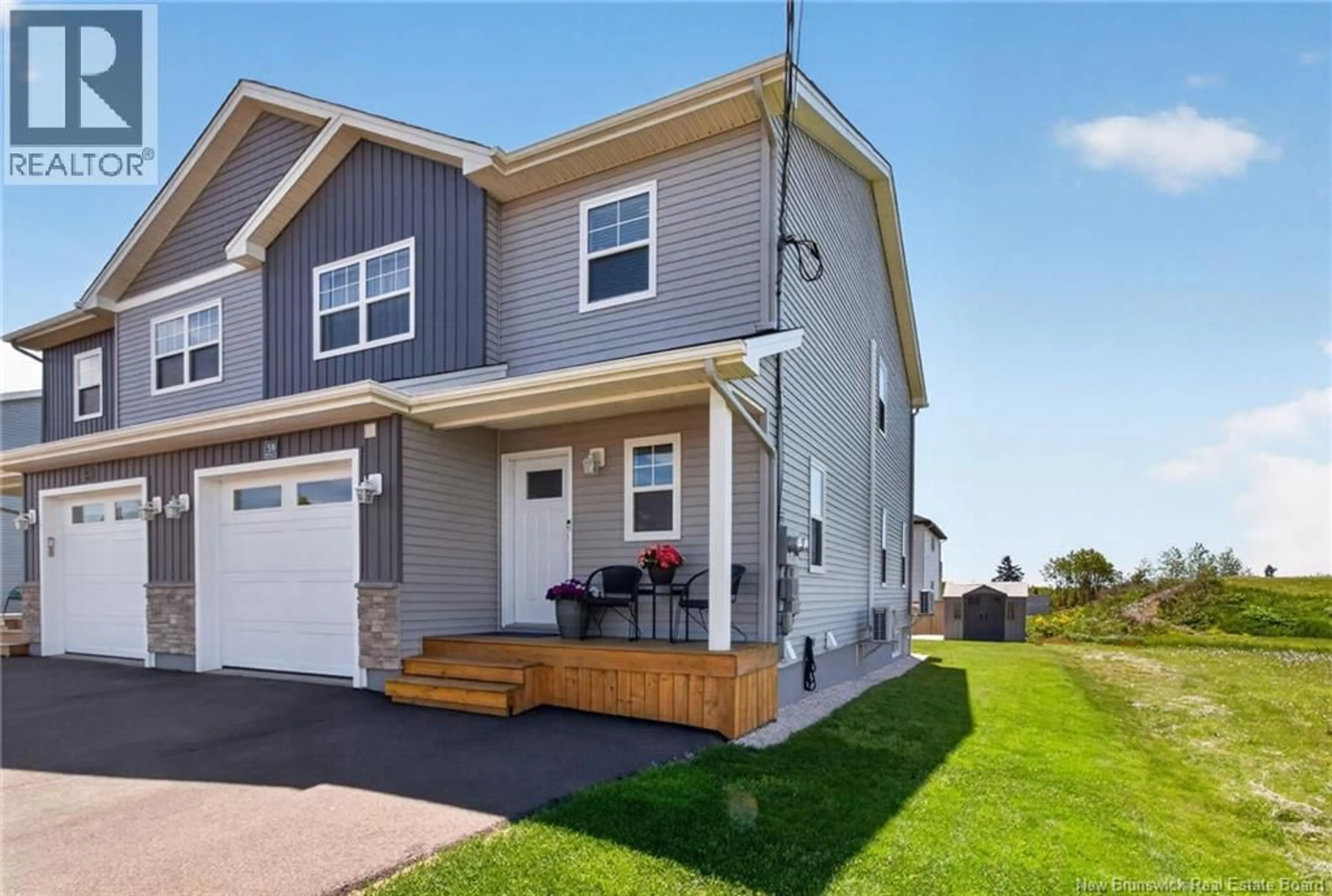 Home with vinyl exterior material, street for 59 WARNER, Moncton New Brunswick E1A5T3