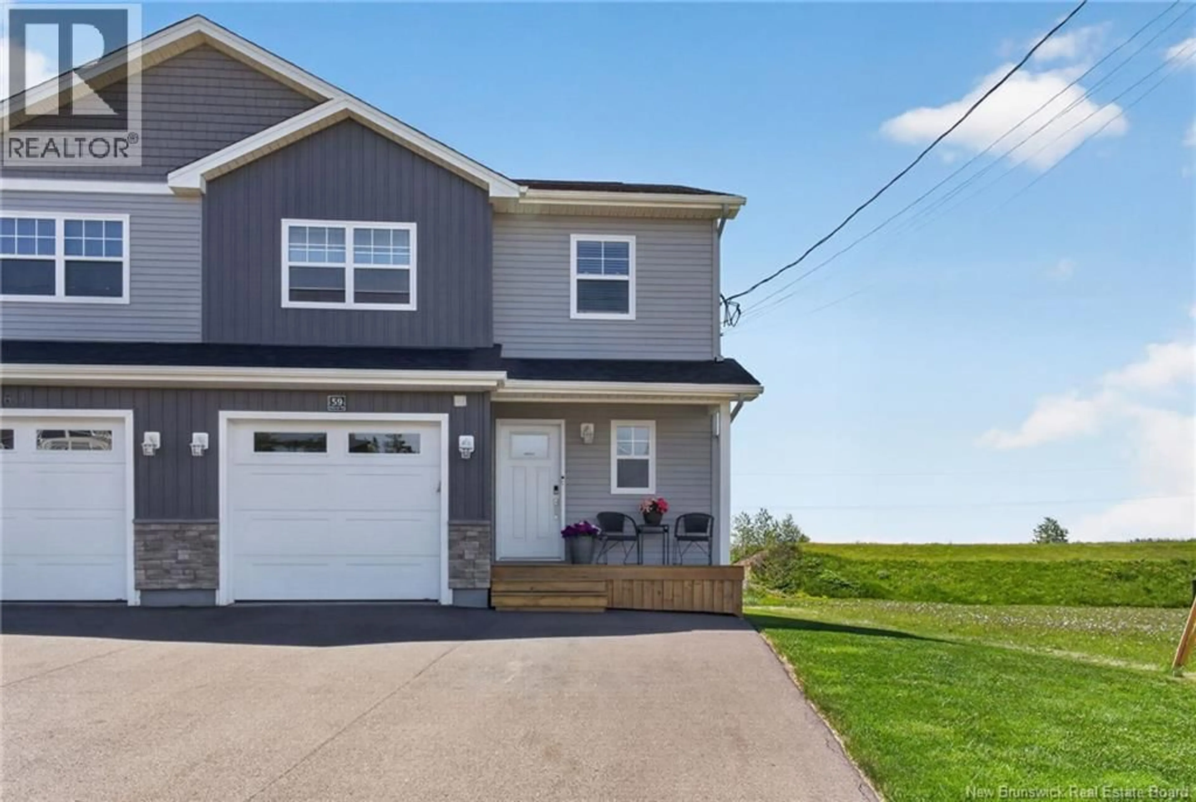 Home with vinyl exterior material, street for 59 WARNER, Moncton New Brunswick E1A5T3