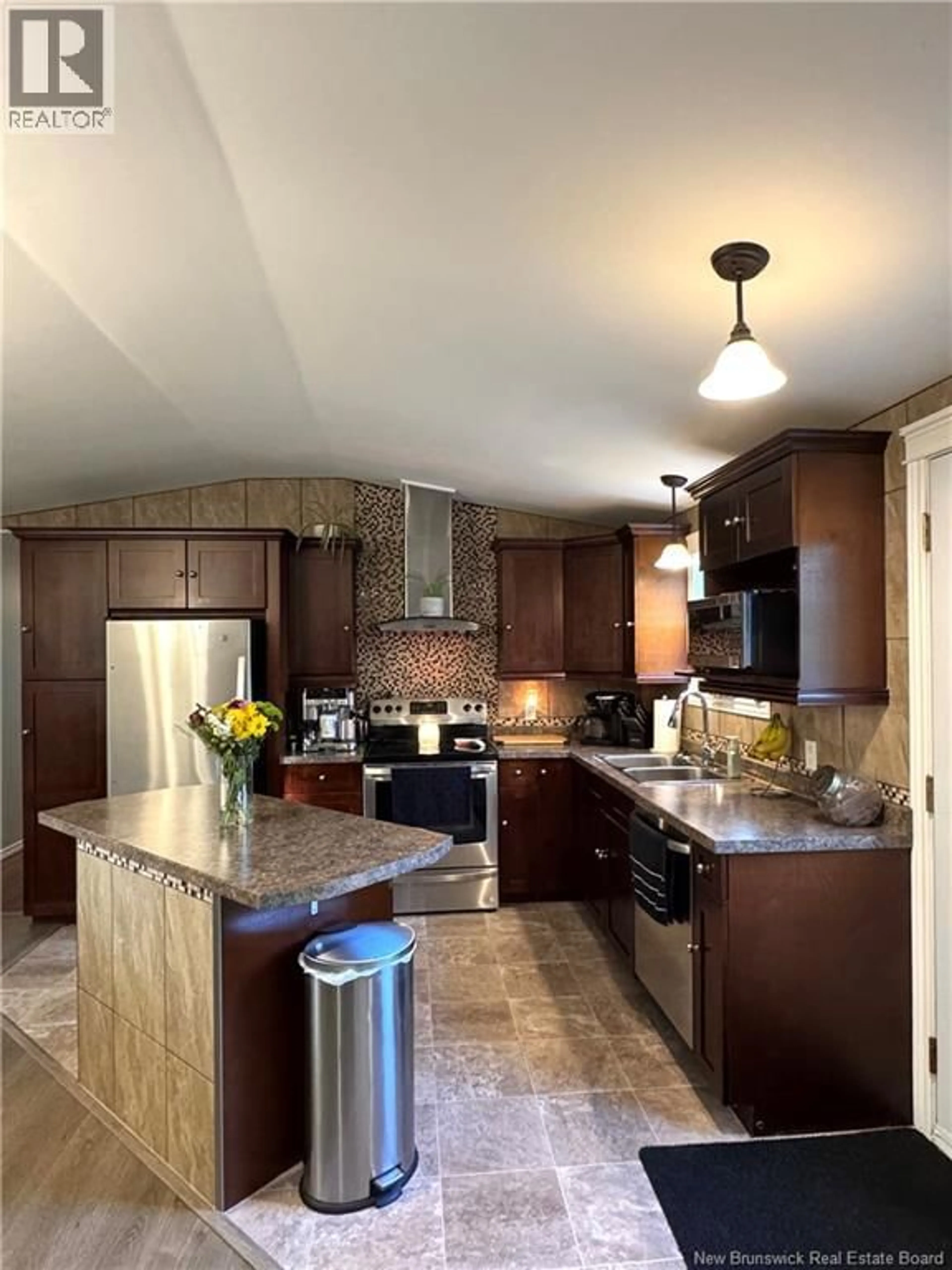 Open concept kitchen, ceramic/tile floor for 491 MCKINNON ROAD, Miramichi New Brunswick E1V6G5