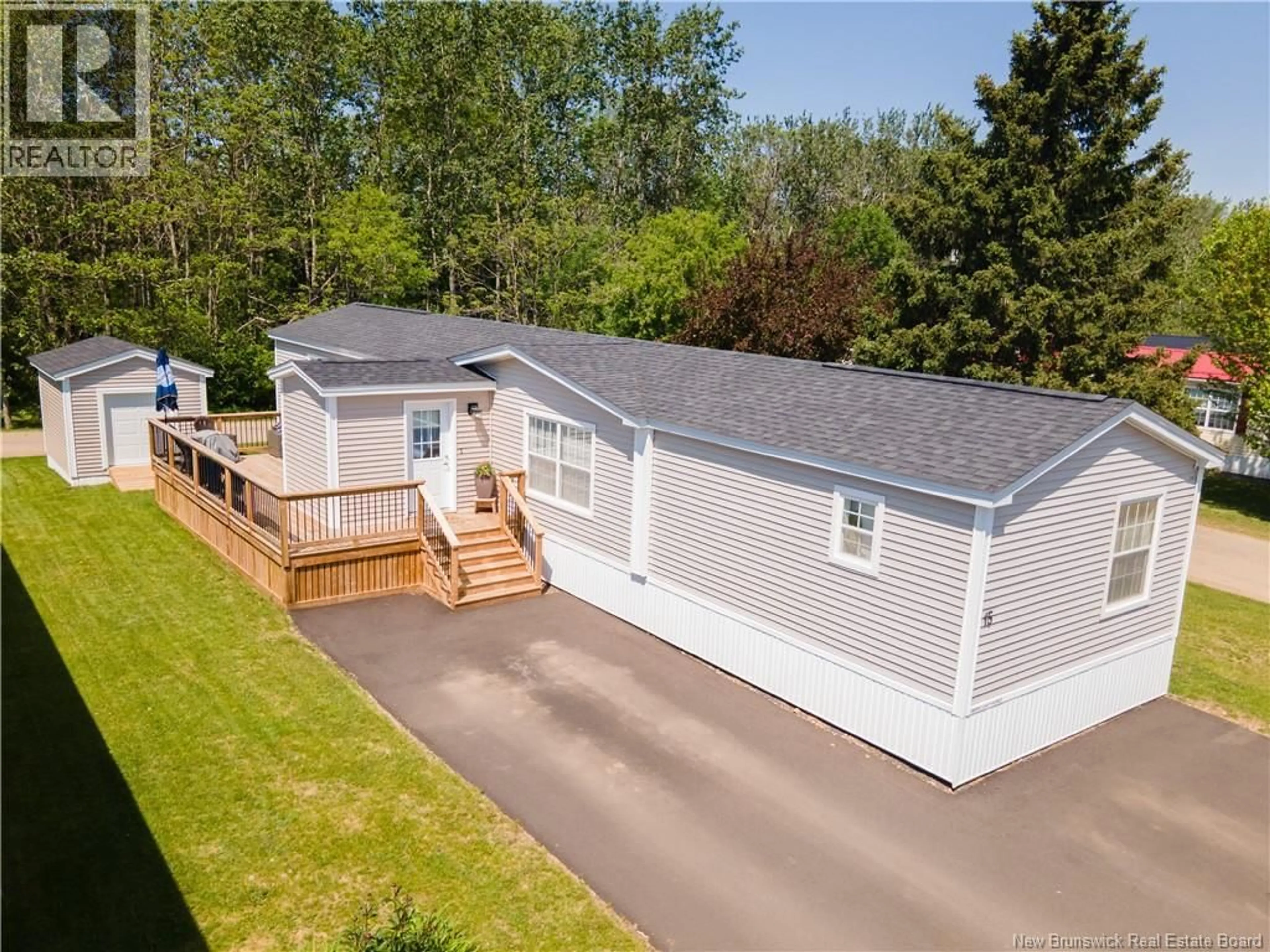 A pic from outside/outdoor area/front of a property/back of a property/a pic from drone, unknown for 15 BROOKVIEW AVENUE, Sussex Corner New Brunswick E4E2W3
