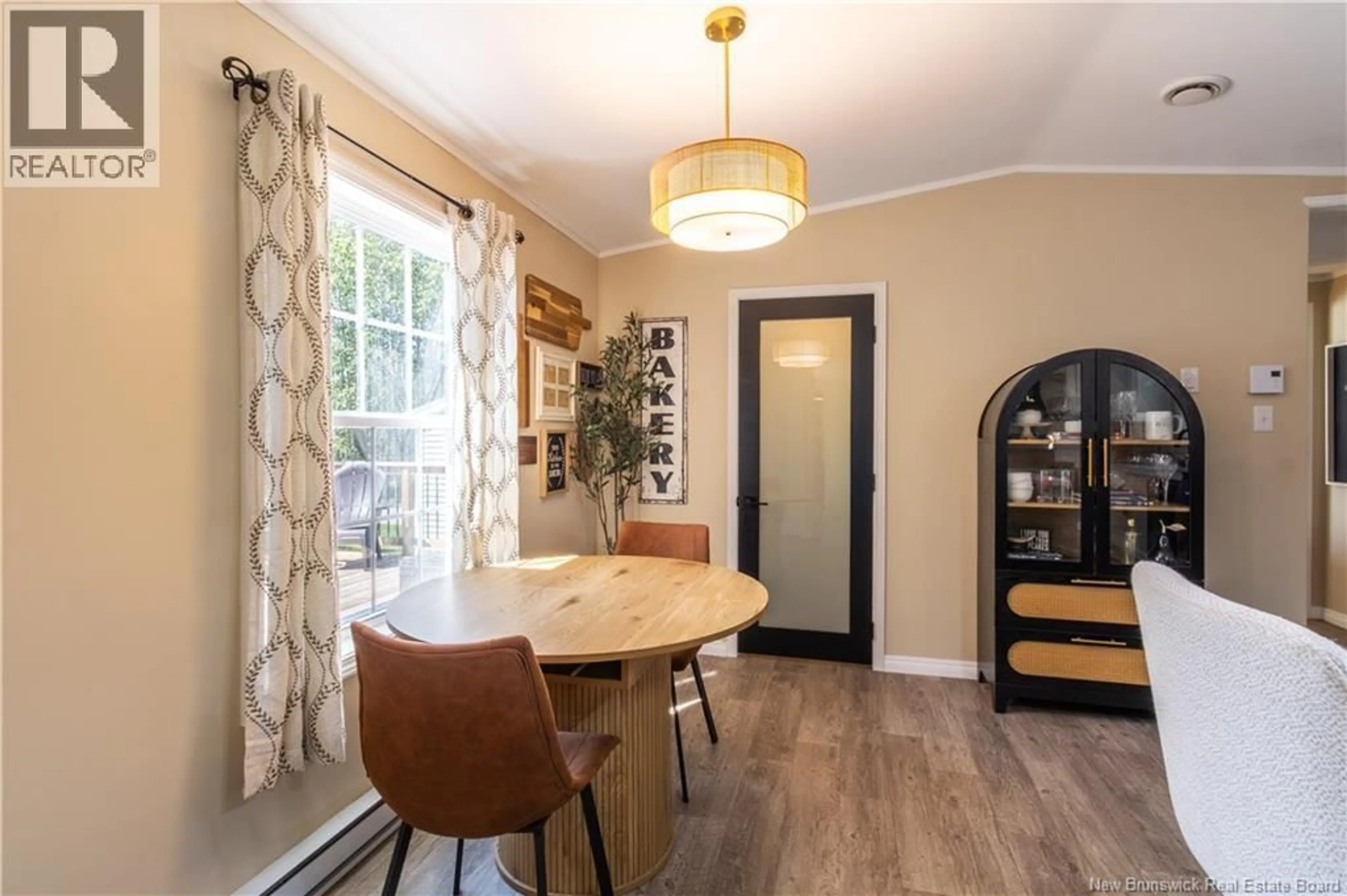 Dining room, wood/laminate floor for 15 BROOKVIEW AVENUE, Sussex Corner New Brunswick E4E2W3