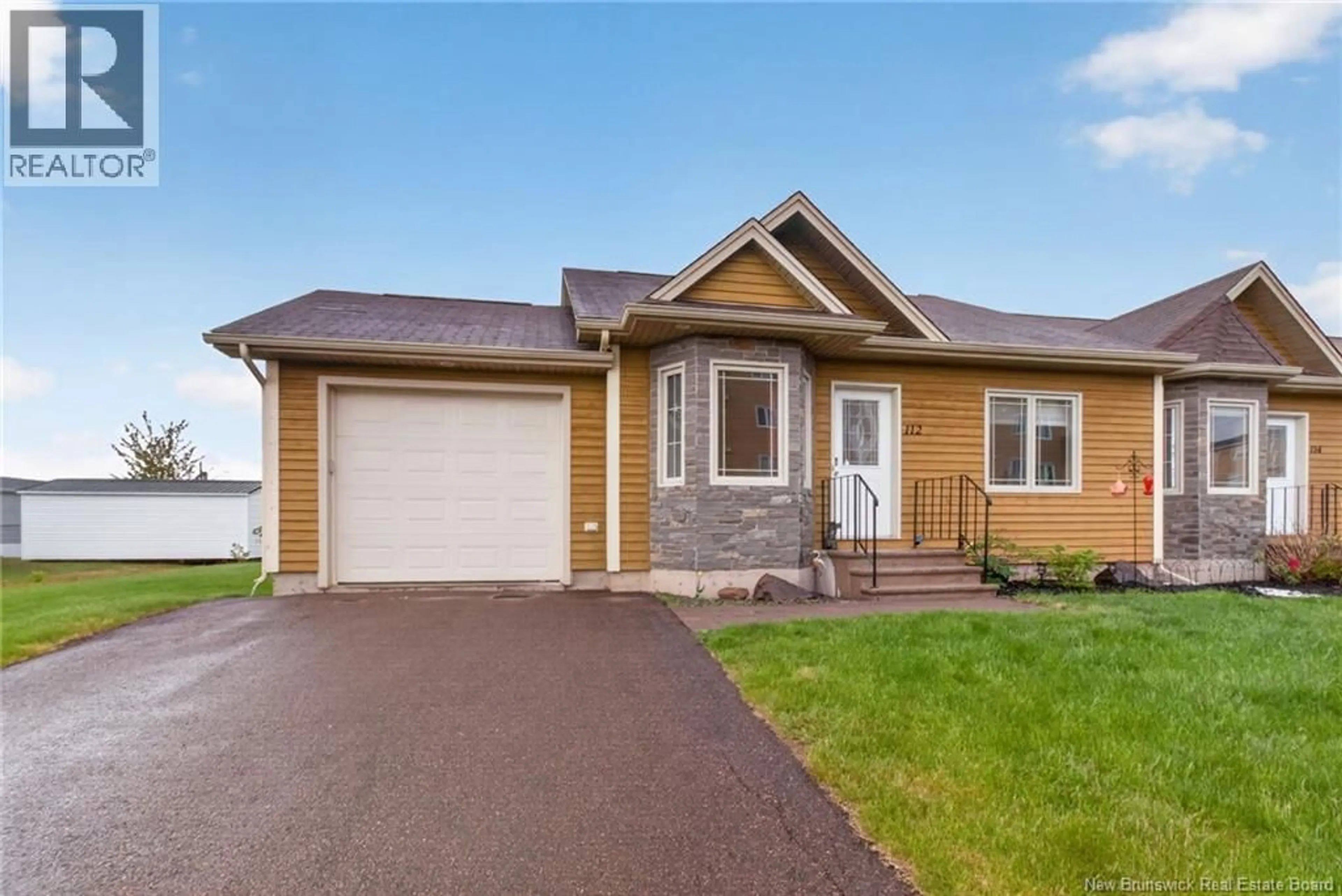 Home with vinyl exterior material, street for 1 - 112 KEDGWICK DRIVE, Dieppe New Brunswick E1A0Z5