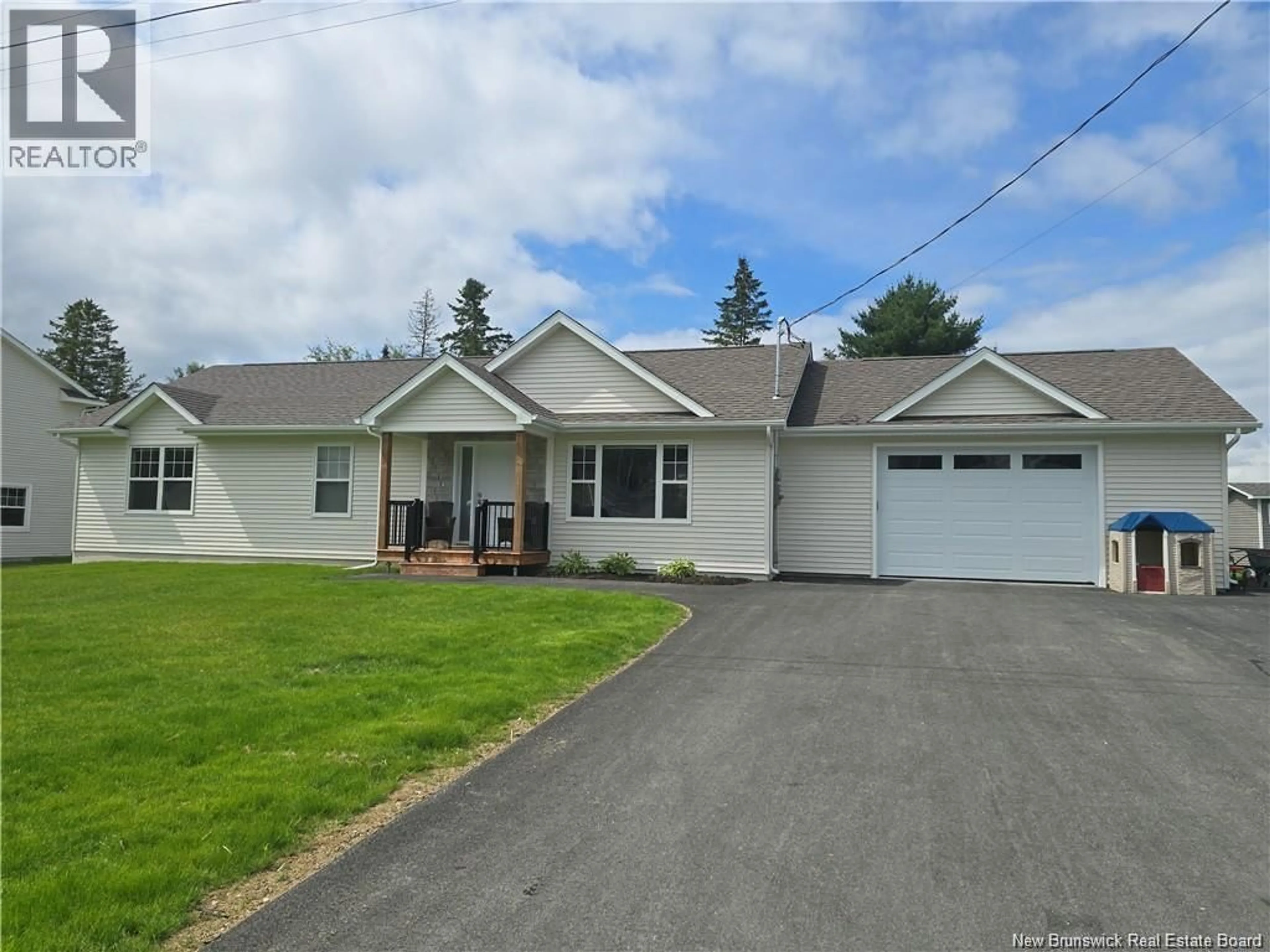 Home with vinyl exterior material, street for 207 CARROLL STREET, Miramichi New Brunswick E1V0M3