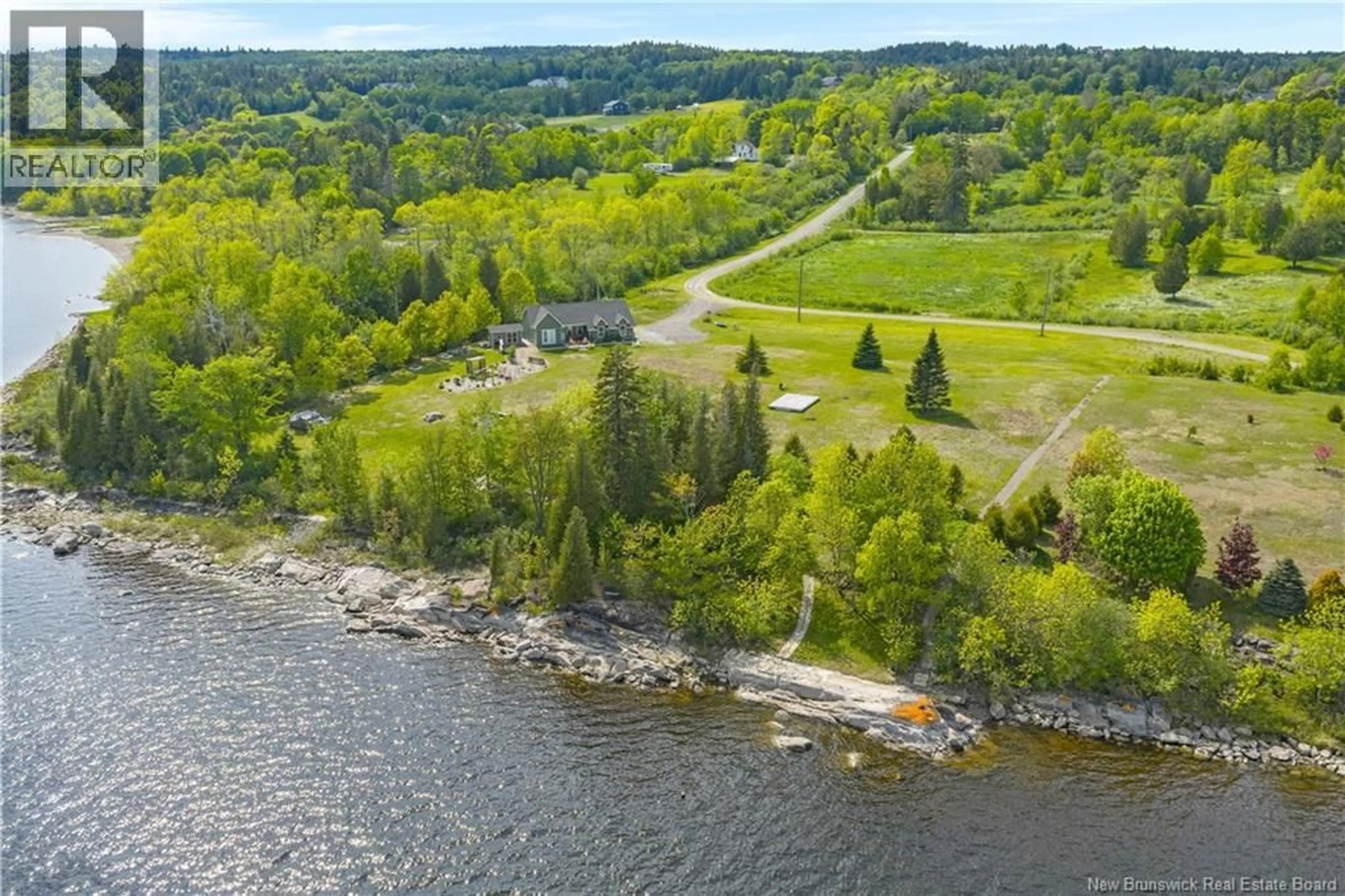 A pic from outside/outdoor area/front of a property/back of a property/a pic from drone, water/lake/river/ocean view for 28 VISTA DRIVE, Clifton Royal New Brunswick E5S0A9