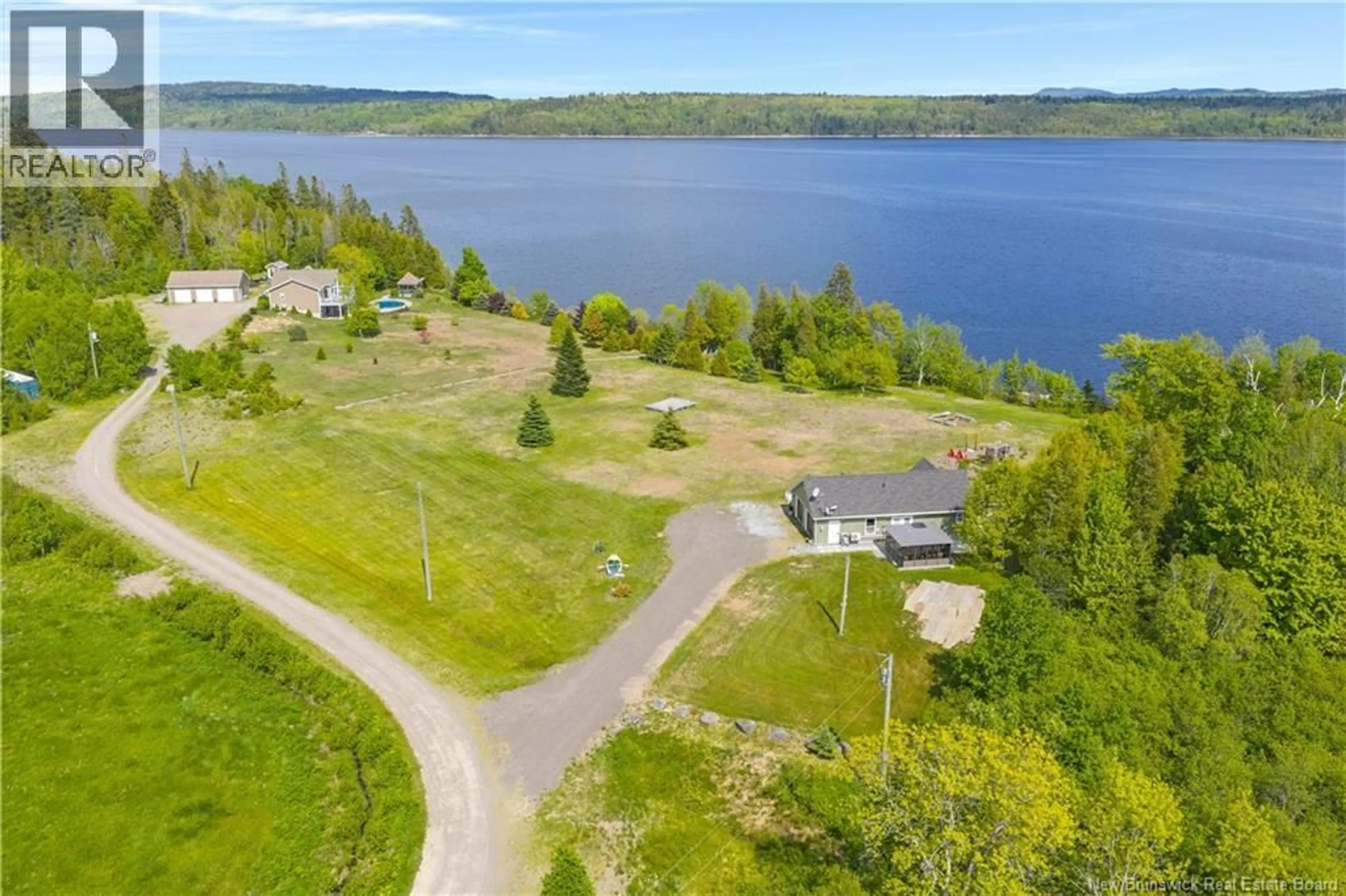 A pic from outside/outdoor area/front of a property/back of a property/a pic from drone, water/lake/river/ocean view for 28 VISTA DRIVE, Clifton Royal New Brunswick E5S0A9