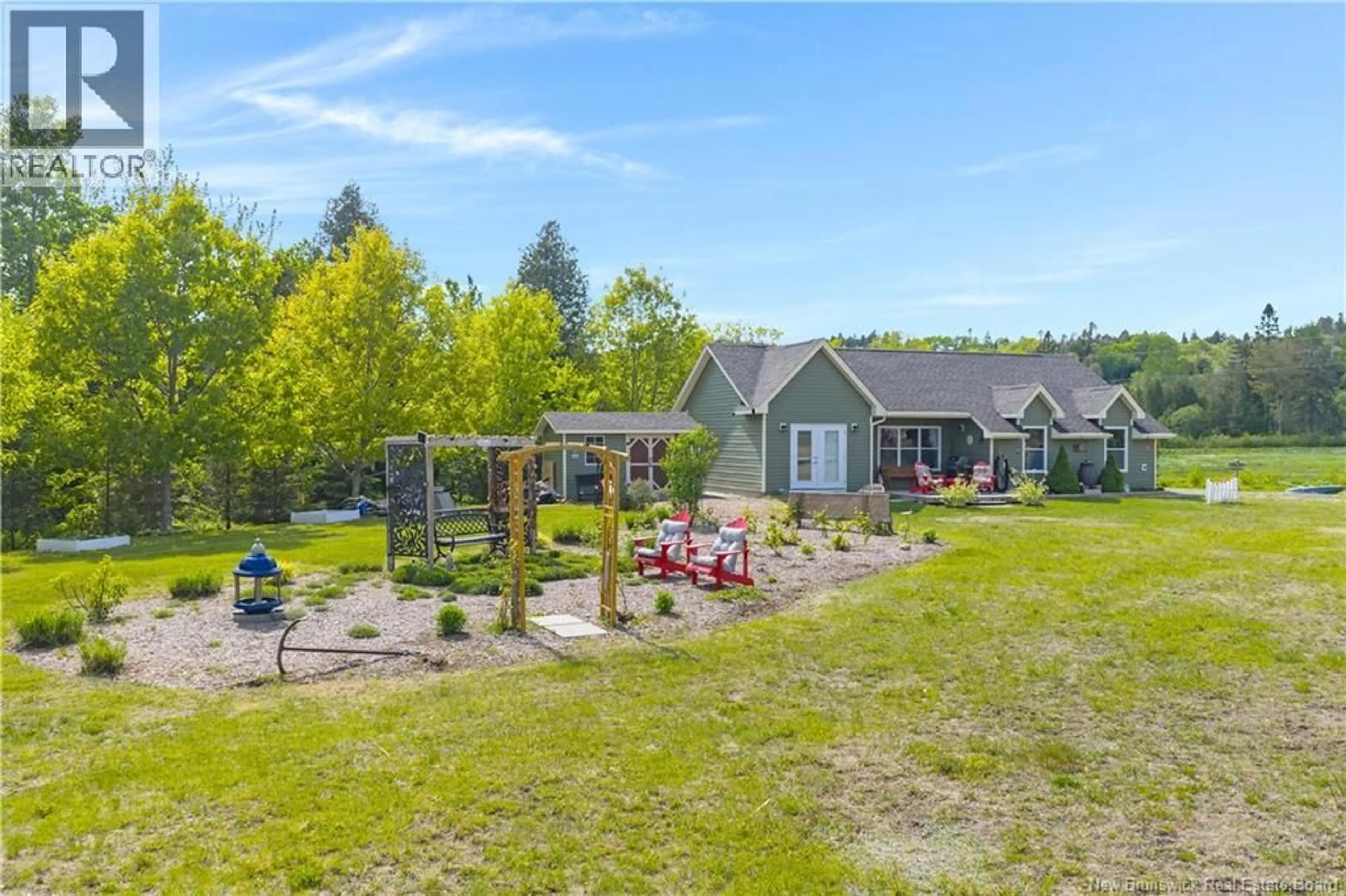 A pic from outside/outdoor area/front of a property/back of a property/a pic from drone, water/lake/river/ocean view for 28 VISTA DRIVE, Clifton Royal New Brunswick E5S0A9