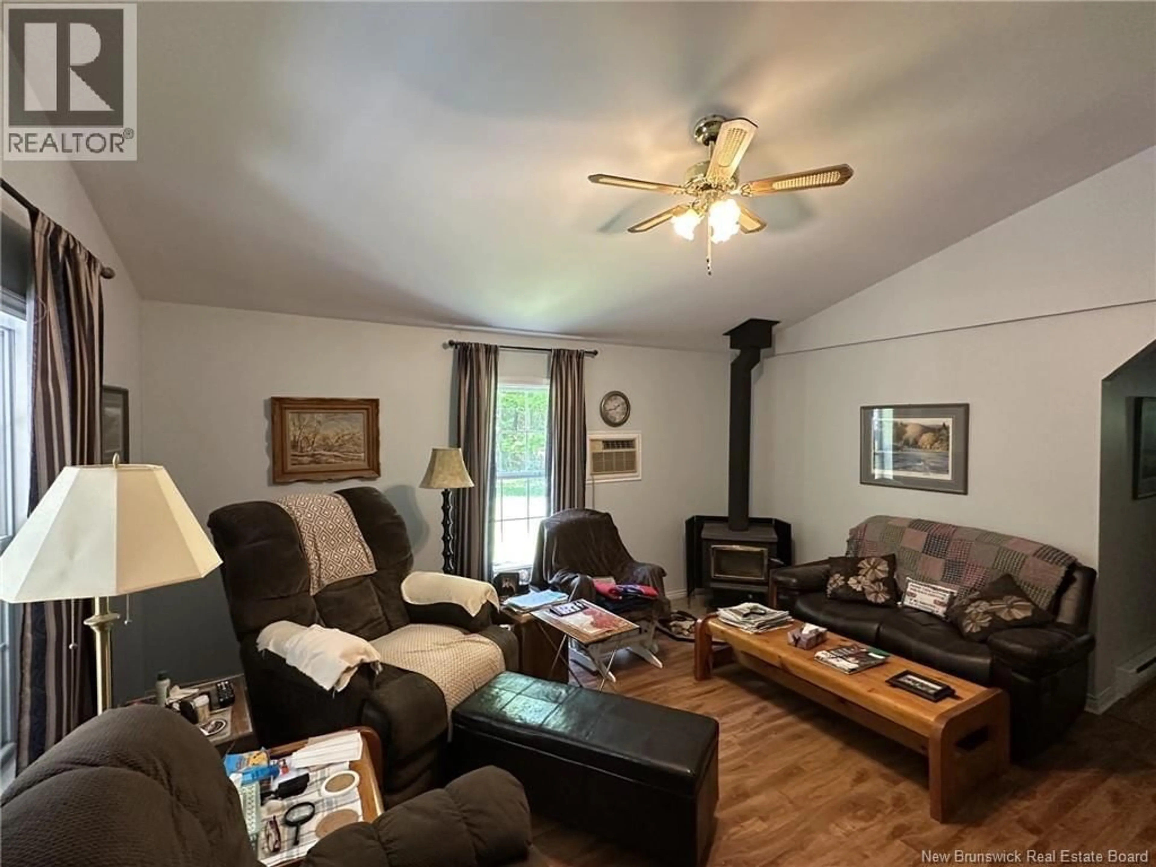 Living room with furniture, wood/laminate floor for 20 SCOTT LANE, Davidson Lake New Brunswick E6G1T3