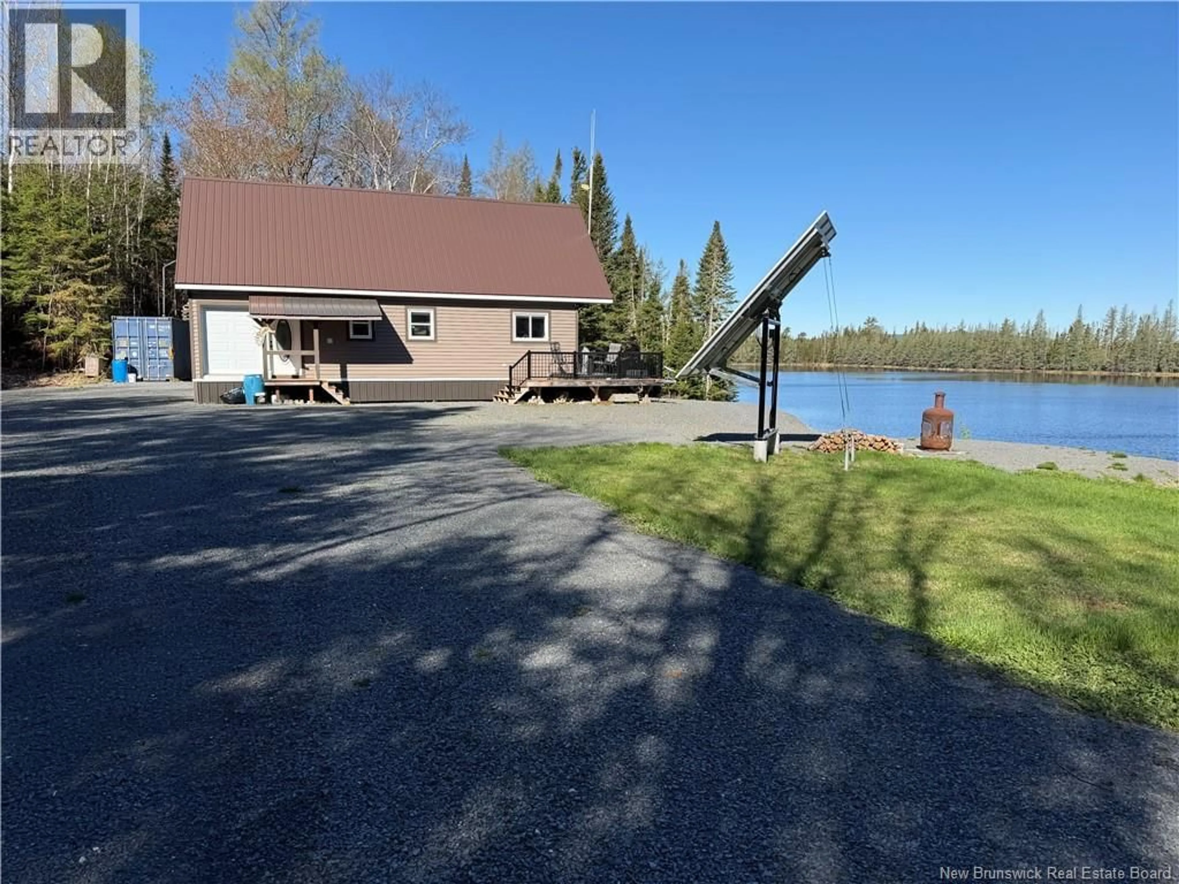 A pic from outside/outdoor area/front of a property/back of a property/a pic from drone, water/lake/river/ocean view for STEWART LAKE ROAD, Blue Mountain Bend New Brunswick E3V2K5