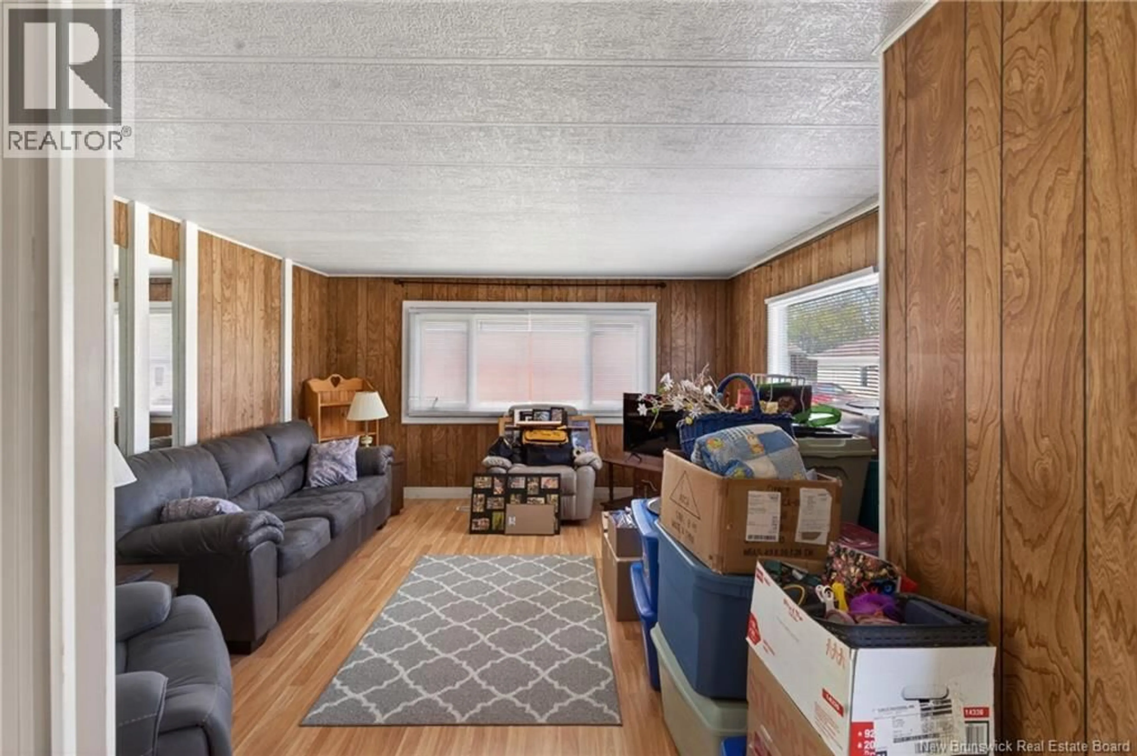 Living room with furniture, wood/laminate floor for 30467 ROUTE 134, Mcleods New Brunswick E3N5V2