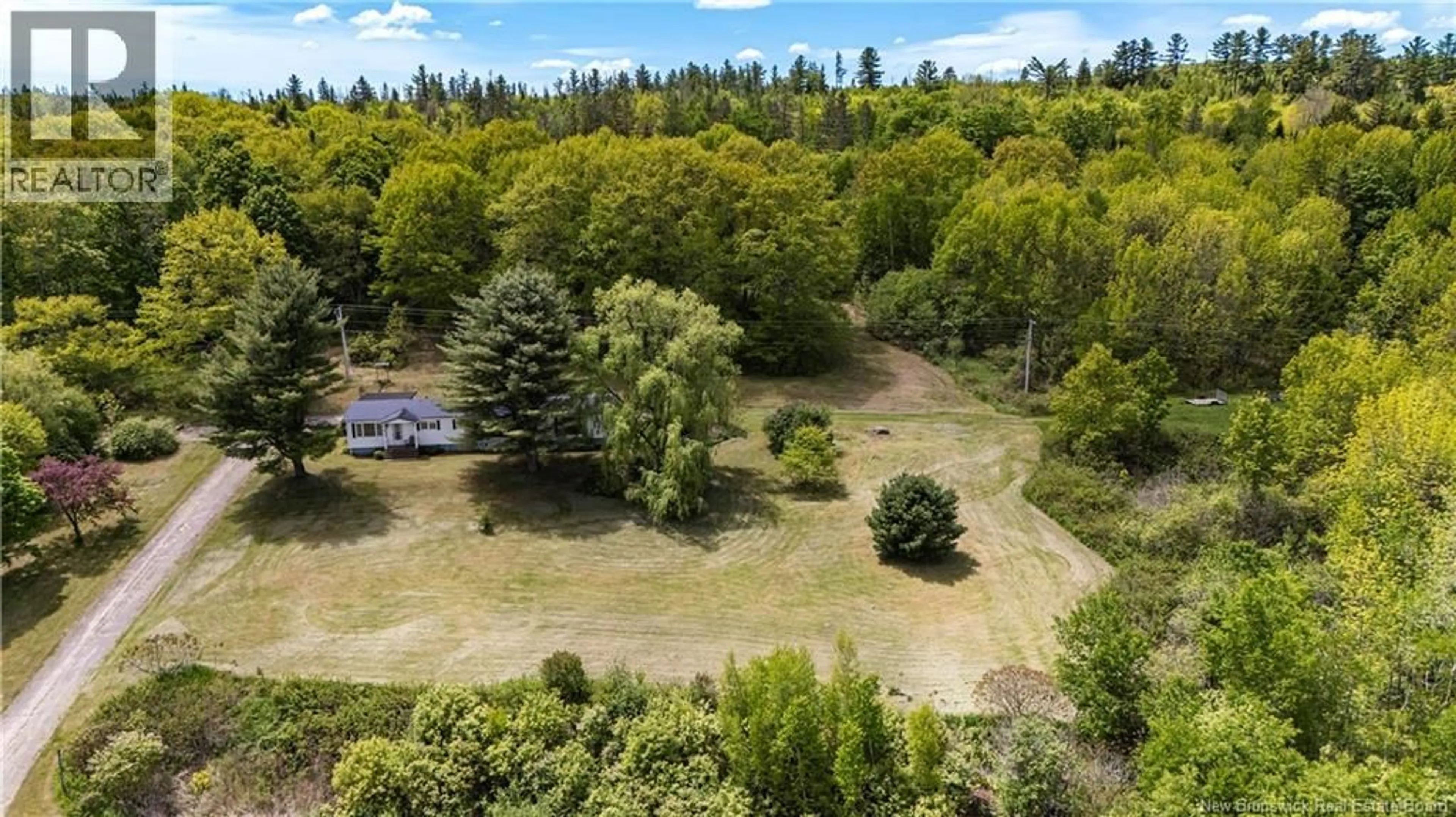 A pic from outside/outdoor area/front of a property/back of a property/a pic from drone, forest/trees view for 6860 ROUTE 102, Dumfries New Brunswick E6G1P3